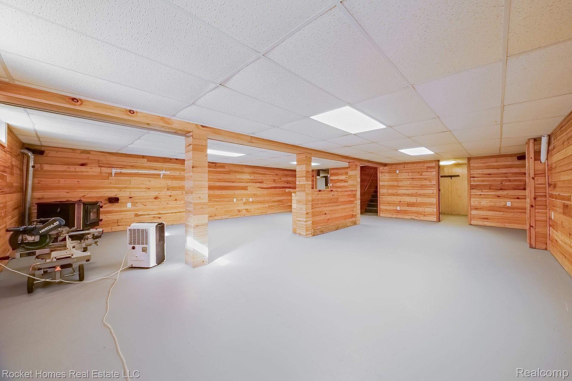 12792 Budd Road Burt, MI 48417 - Photo 34 of 42 033-photo-finished-basement-8986900.jpg