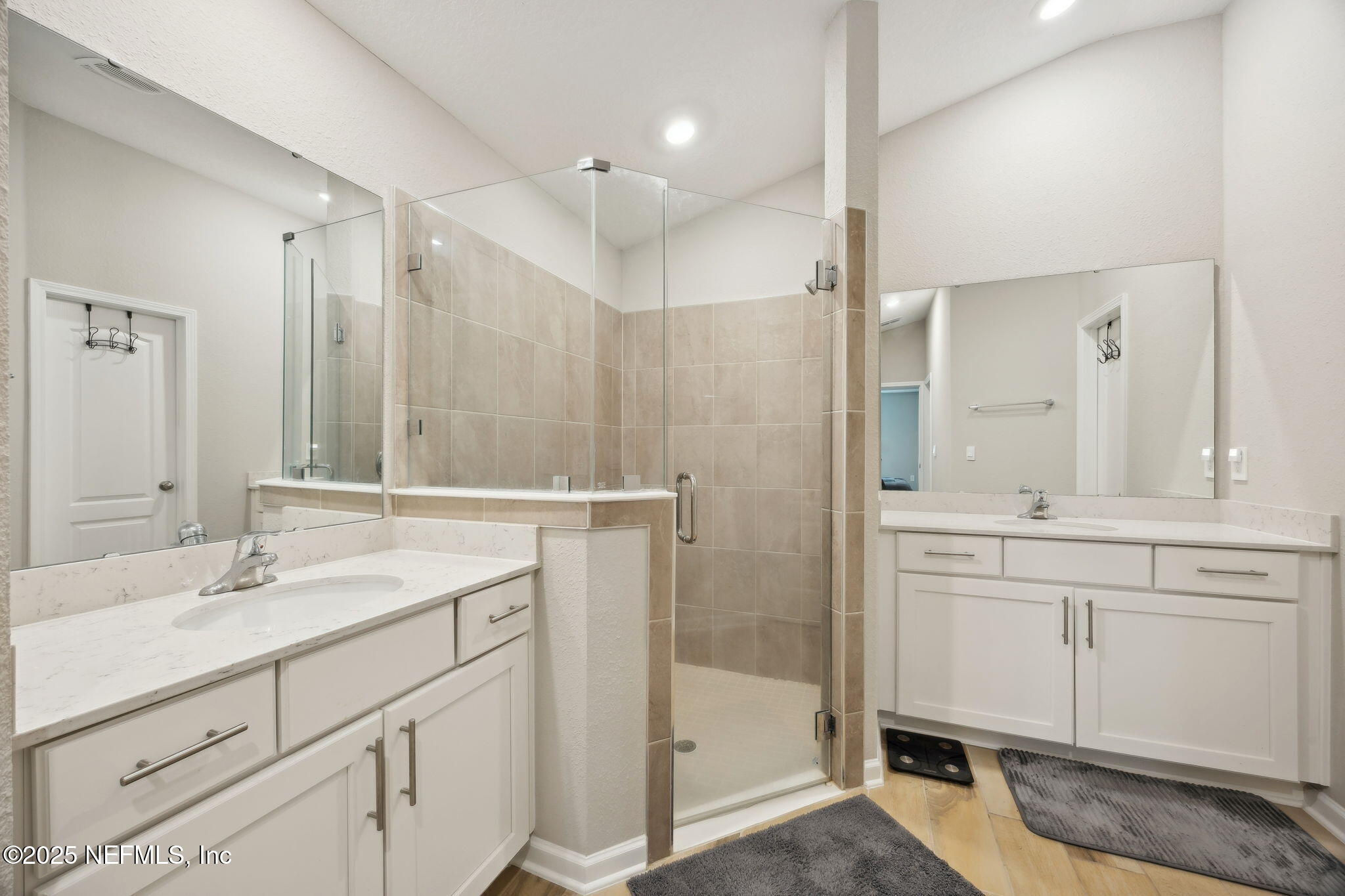 34 Riva Ridge Court Jacksonville, FL 32218 - Photo 18 of 34 a bathroom with a sink shower and a mirror
