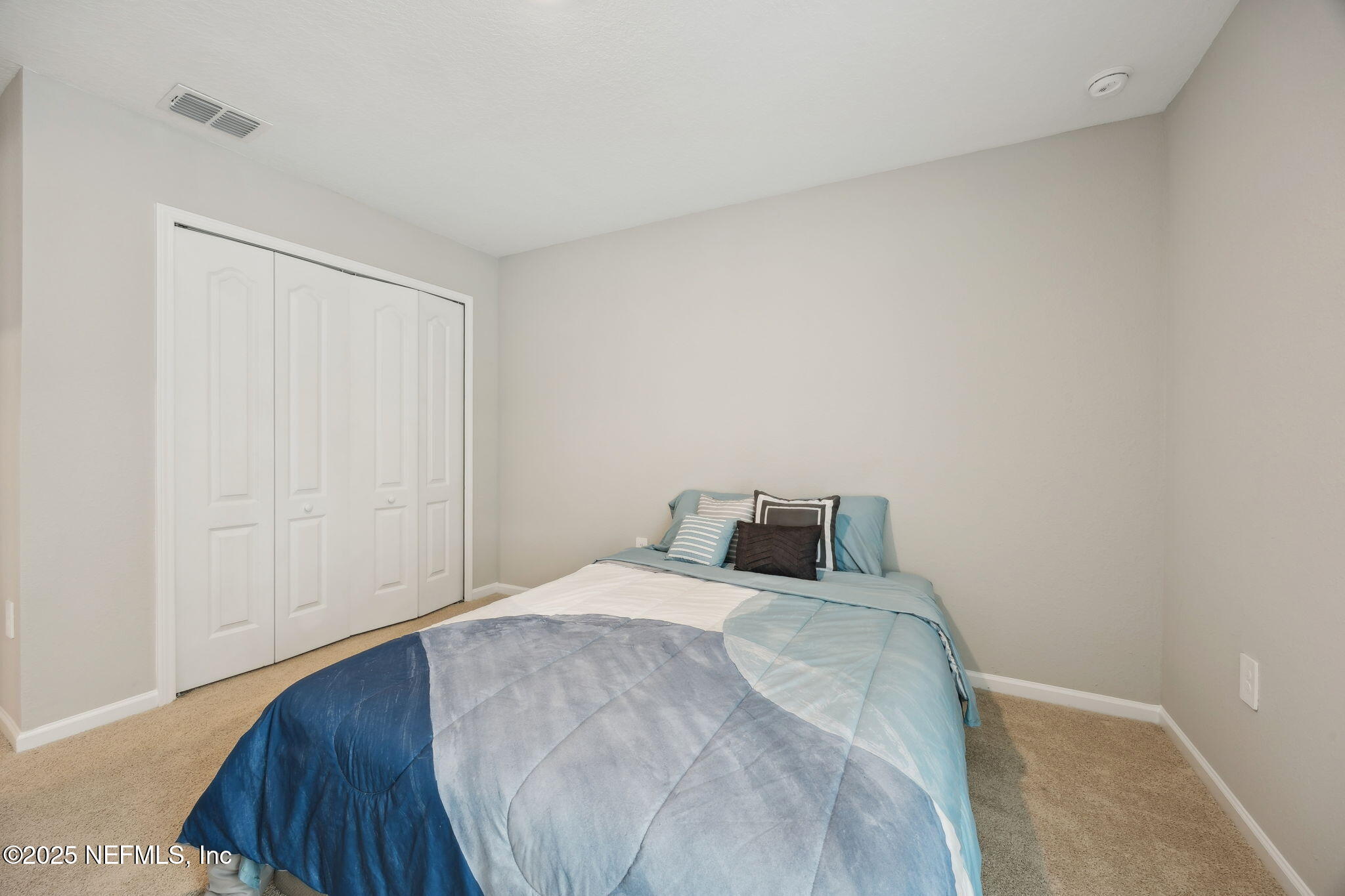 34 Riva Ridge Court Jacksonville, FL 32218 - Photo 20 of 34 a bedroom with a bed