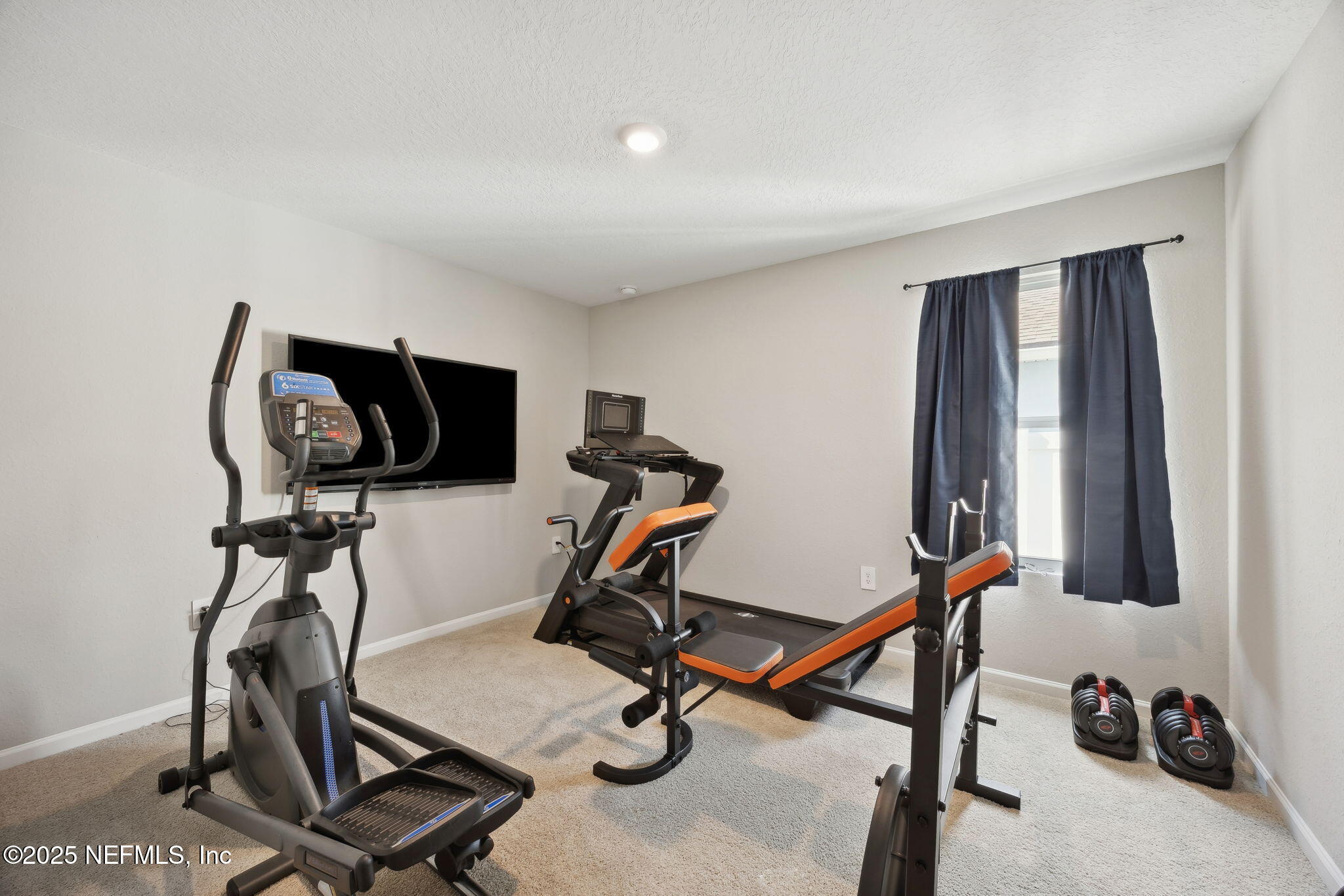 34 Riva Ridge Court Jacksonville, FL 32218 - Photo 22 of 34 a view of a room with gym equipment