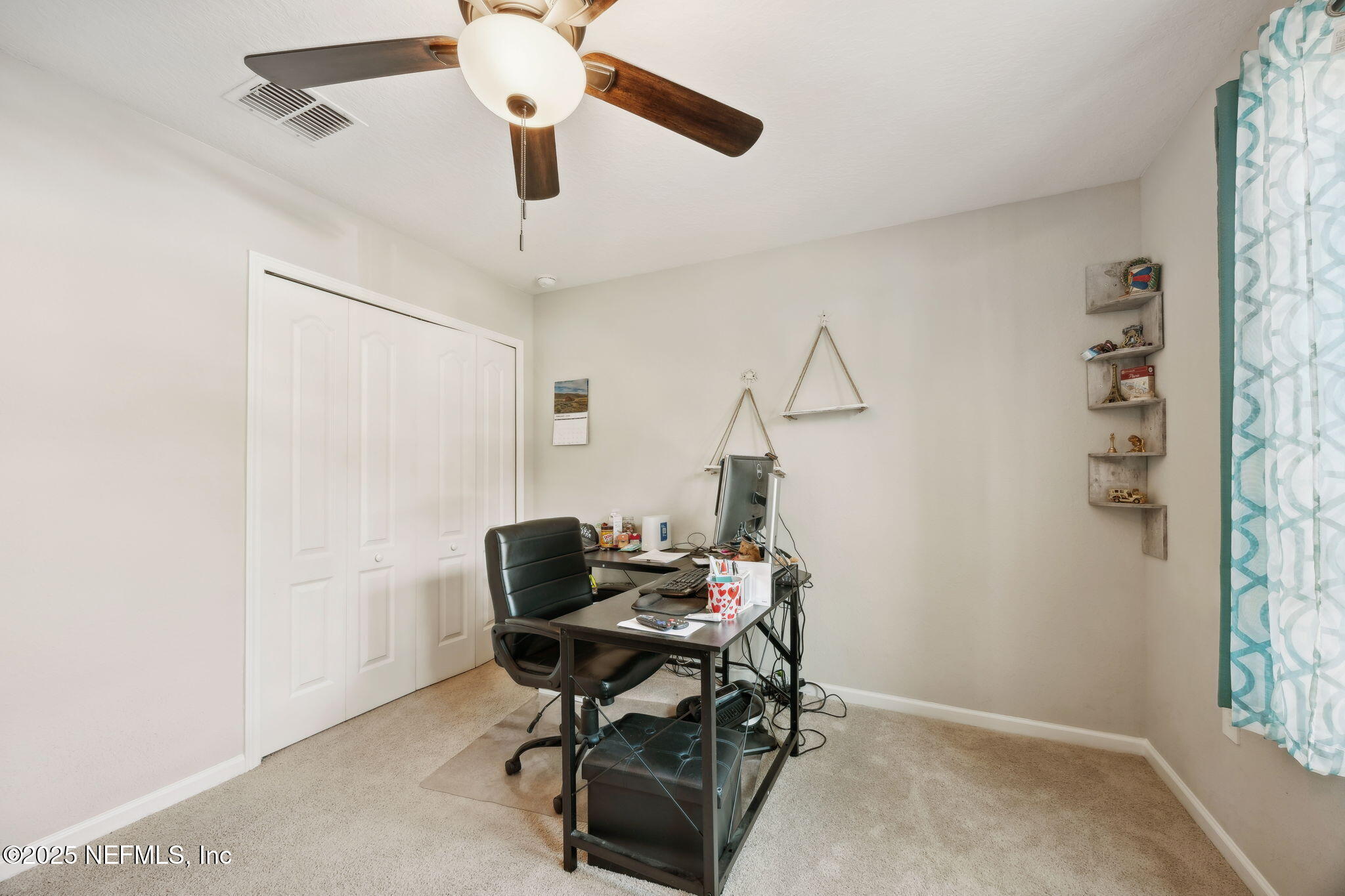 34 Riva Ridge Court Jacksonville, FL 32218 - Photo 26 of 34 a workspace with chandelier fan and a window