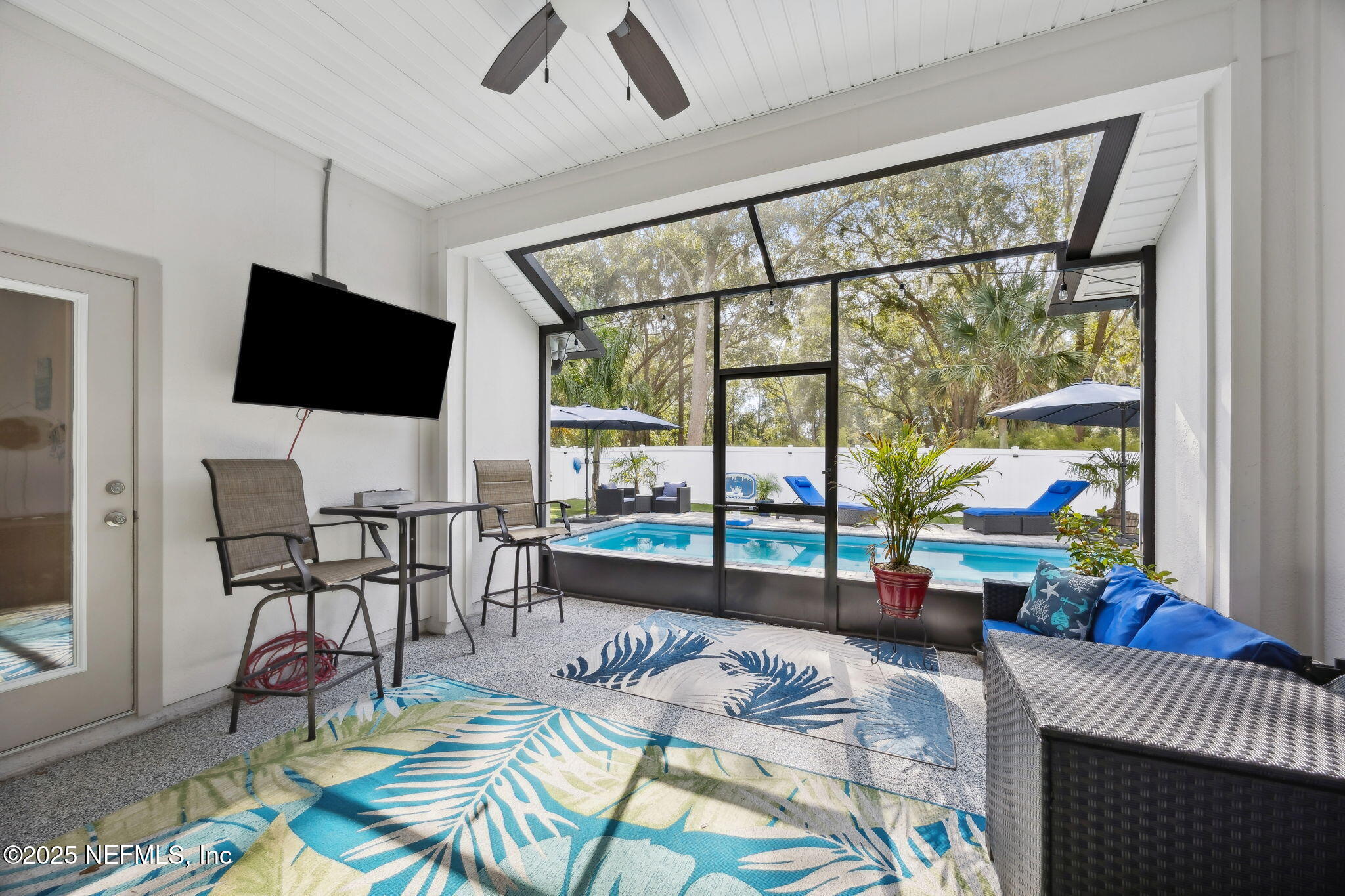 34 Riva Ridge Court Jacksonville, FL 32218 - Photo 27 of 34 a living room with furniture and a flat screen tv