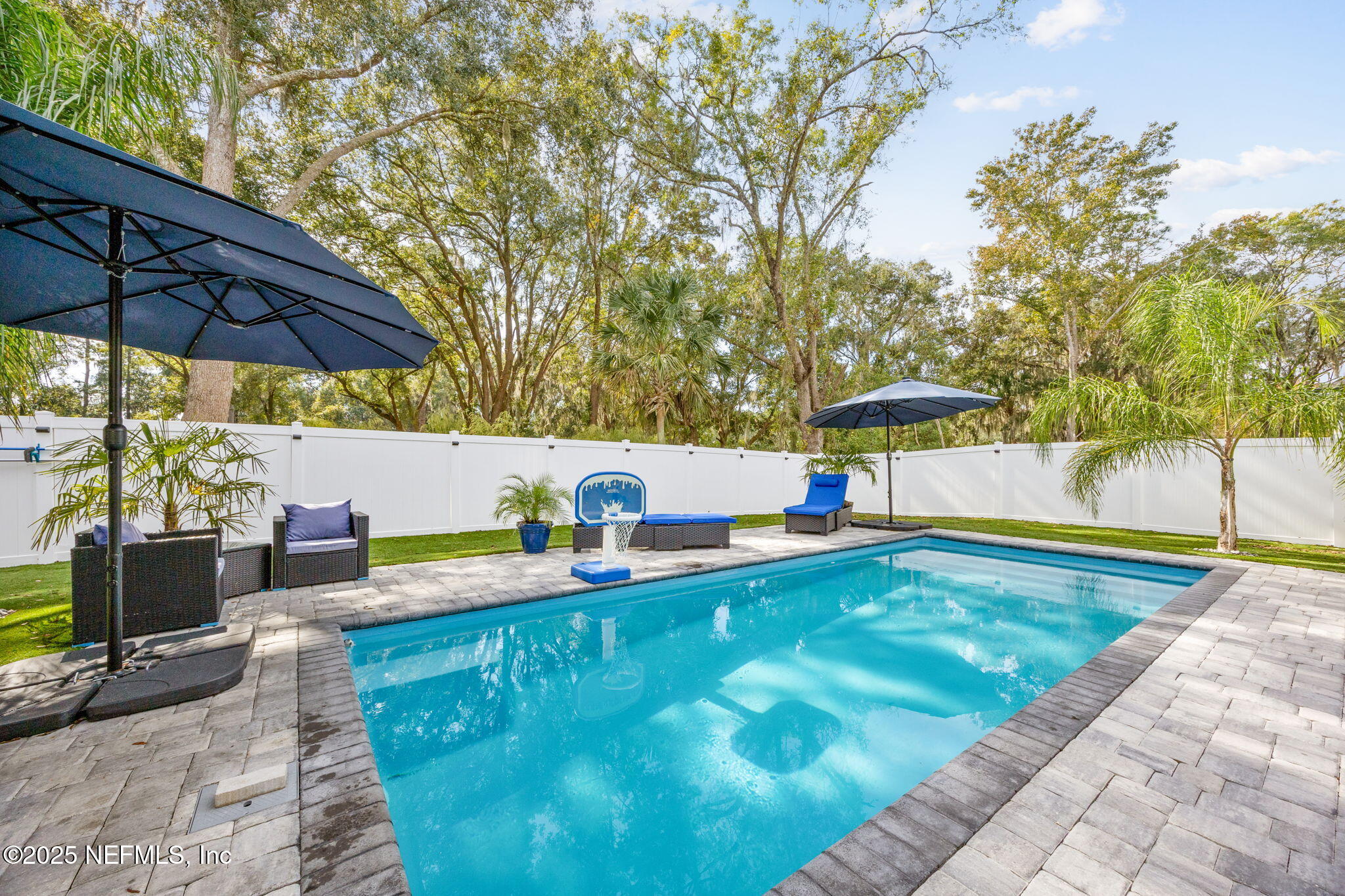 34 Riva Ridge Court Jacksonville, FL 32218 - Photo 30 of 34 a view of a swimming pool with a patio