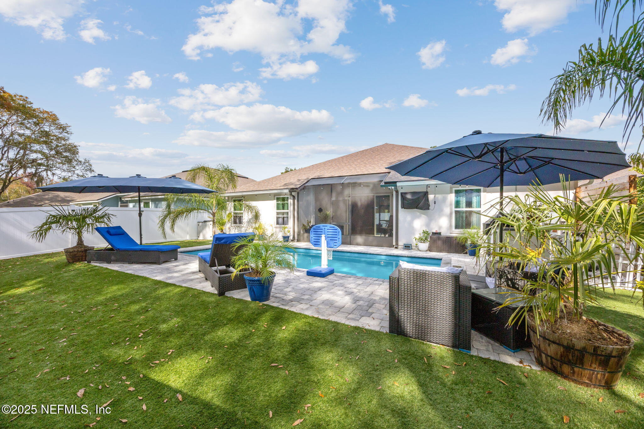 34 Riva Ridge Court Jacksonville, FL 32218 - Photo 32 of 34 a view of a house with backyard outdoor seating area and furniture