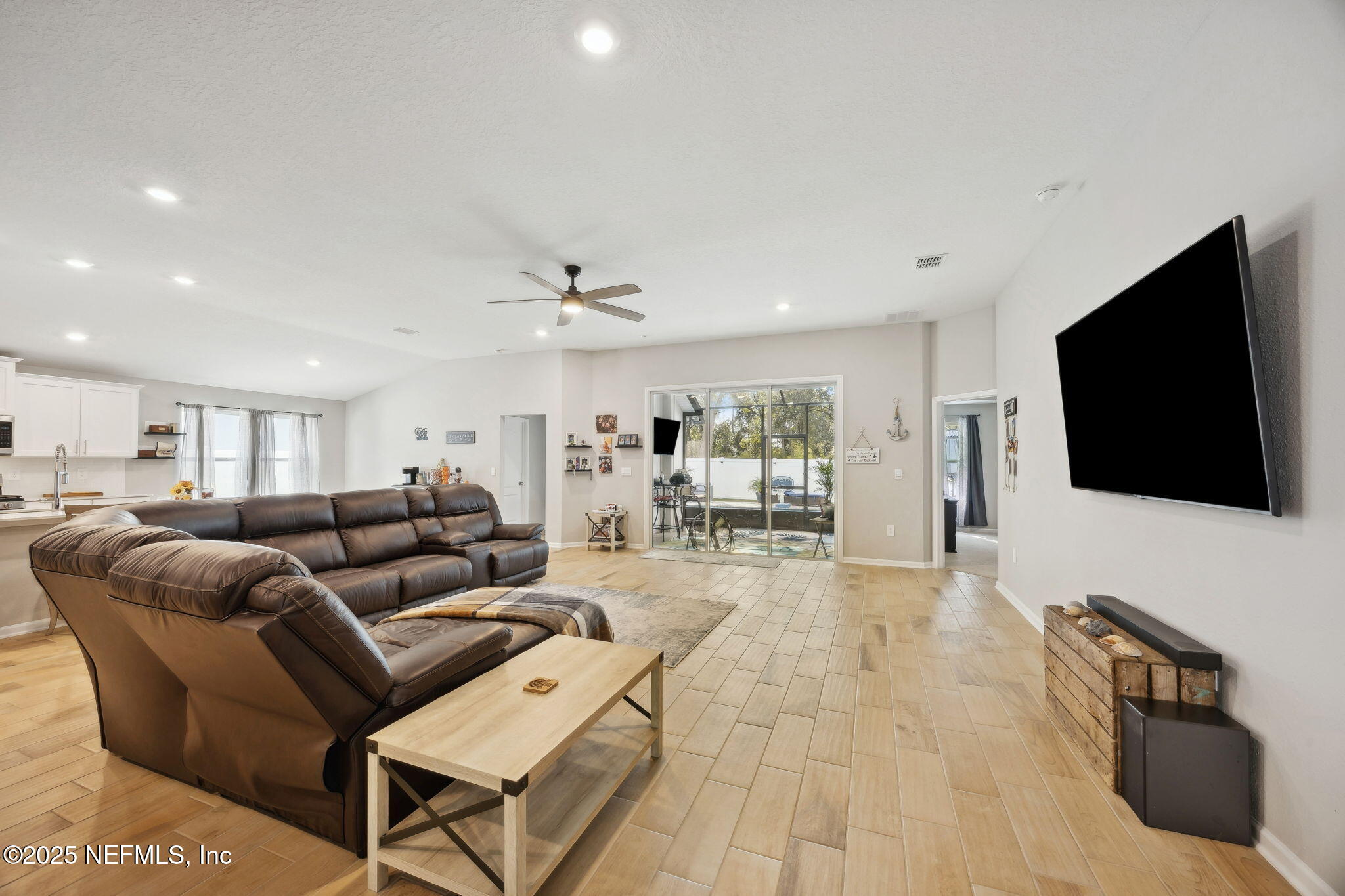 34 Riva Ridge Court Jacksonville, FL 32218 - Photo 4 of 34 a living room with furniture and a flat screen tv