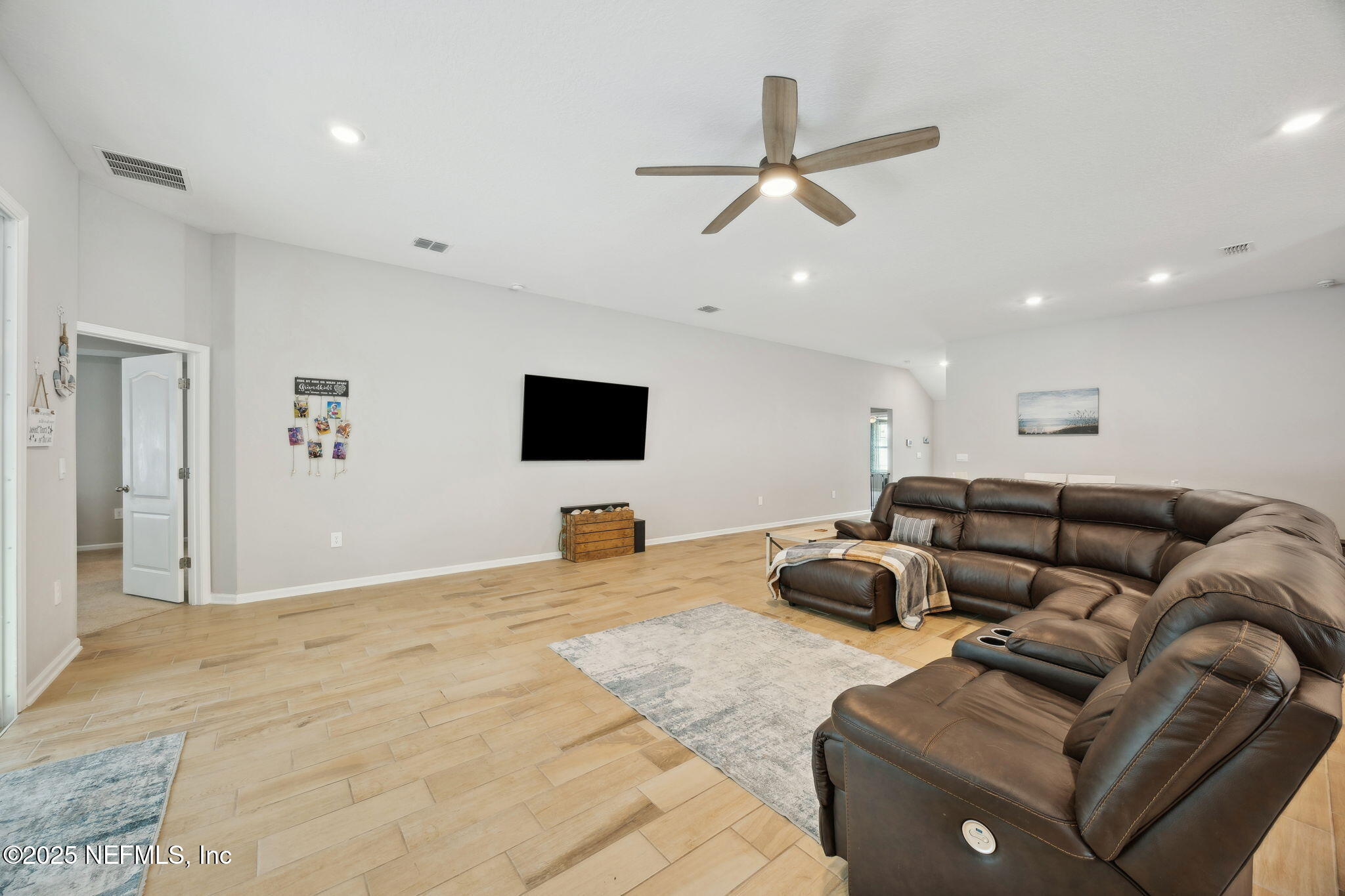 34 Riva Ridge Court Jacksonville, FL 32218 - Photo 5 of 34 a living room with furniture and a flat screen tv