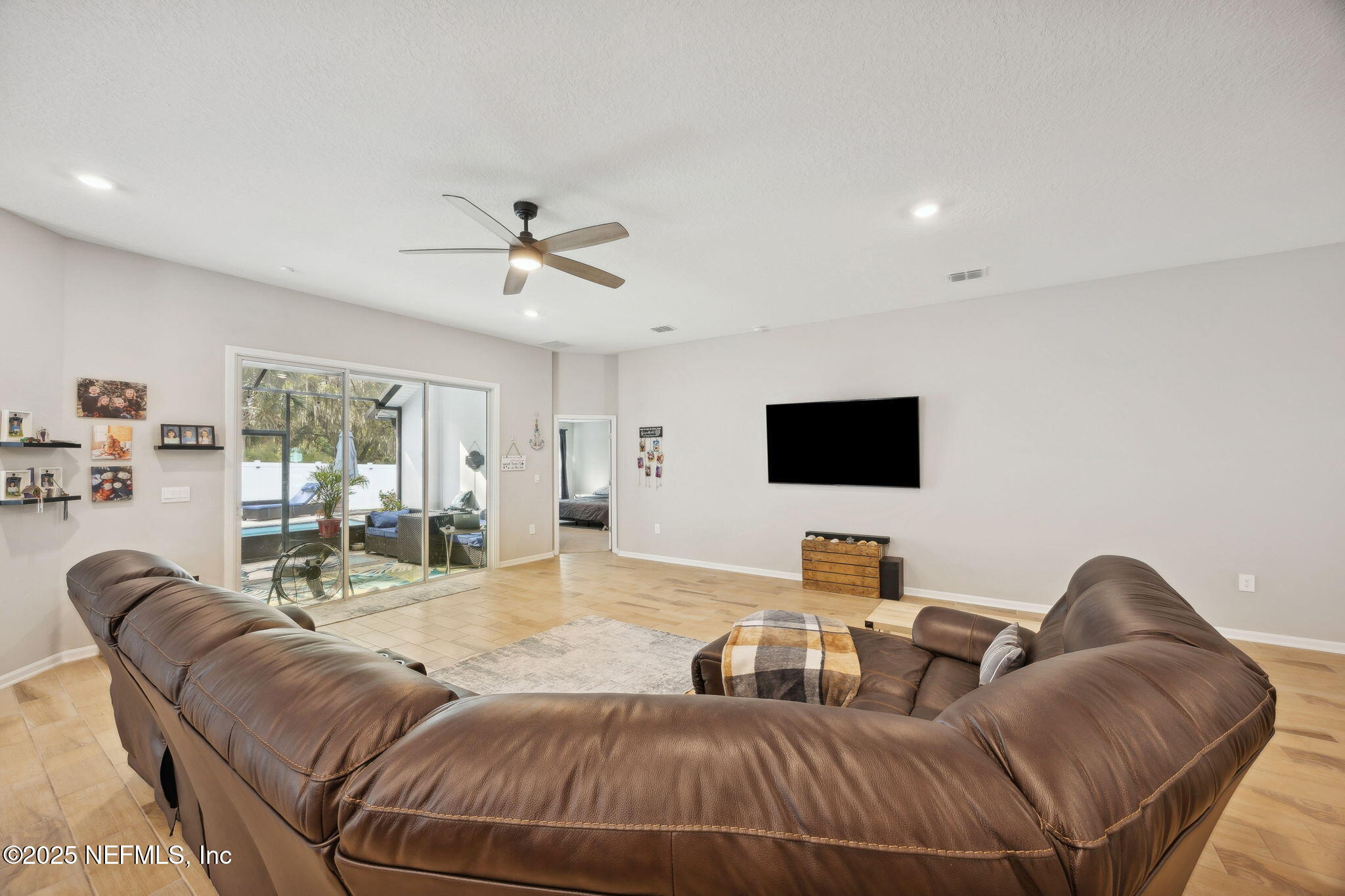 34 Riva Ridge Court Jacksonville, FL 32218 - Photo 6 of 34 a living room with furniture and a flat screen tv