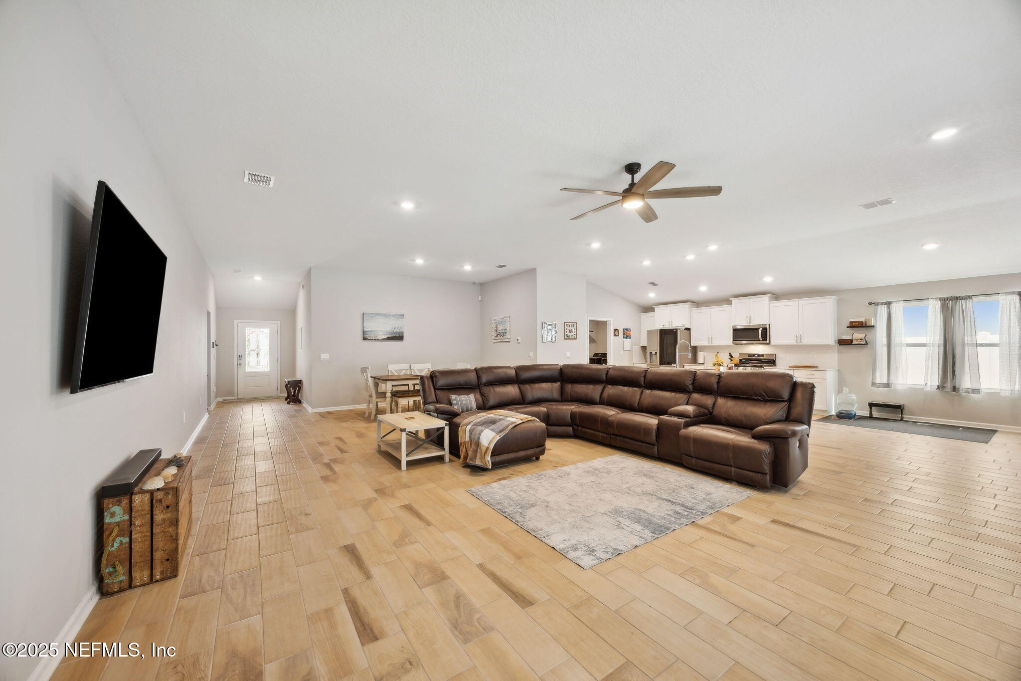 34 Riva Ridge Court Jacksonville, FL 32218 - Photo 7 of 34 a living room with furniture and a flat screen tv