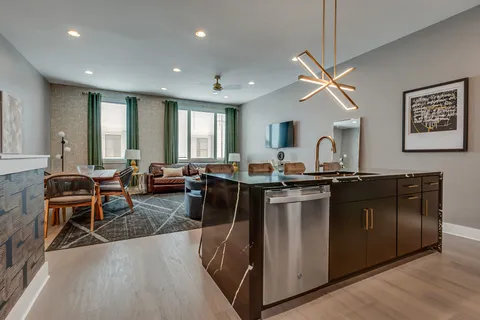 a kitchen with a stove and a sink