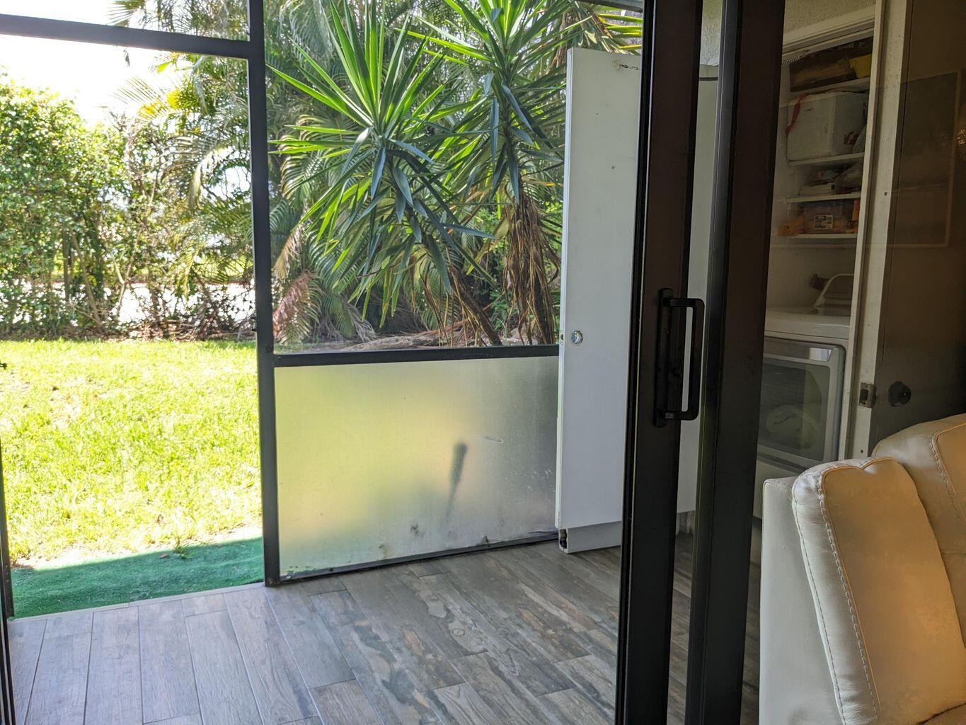 400 Club Circle, Unit 107 Boca Raton, FL 33487 - Photo 9 of 10 Screened Patio/Laundry