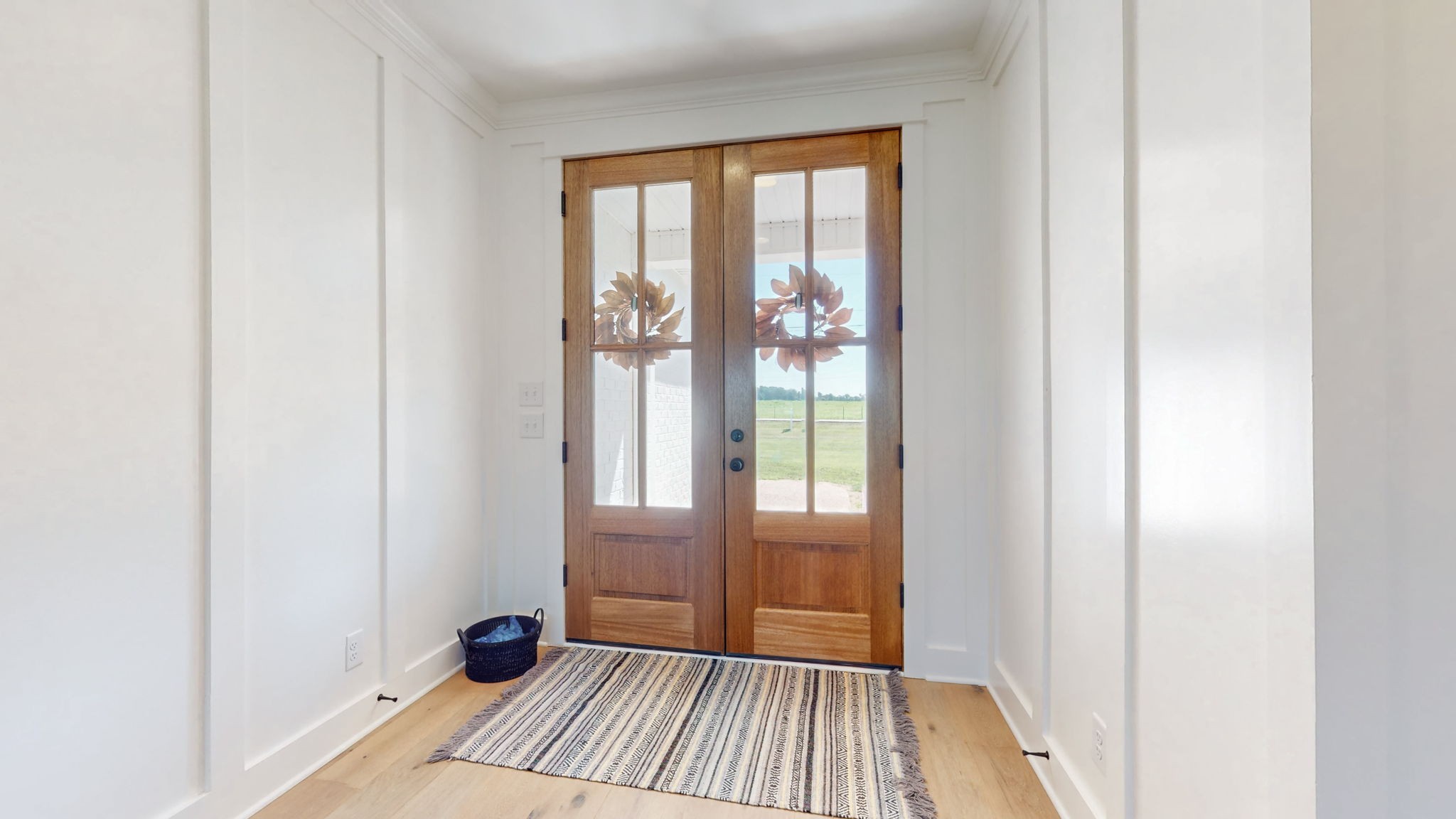 540 Bradshaw Road Lebanon, TN 37087 - Photo 7 of 65 a view of a room with wooden floor and windows