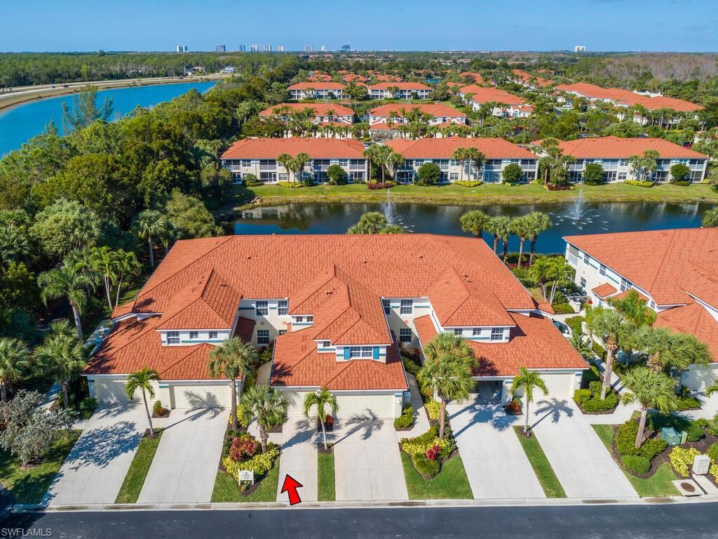 23831 San Marino Road, Unit 102 Estero, FL 34135 - Photo 28 of 39 Aerial view of a large body of water