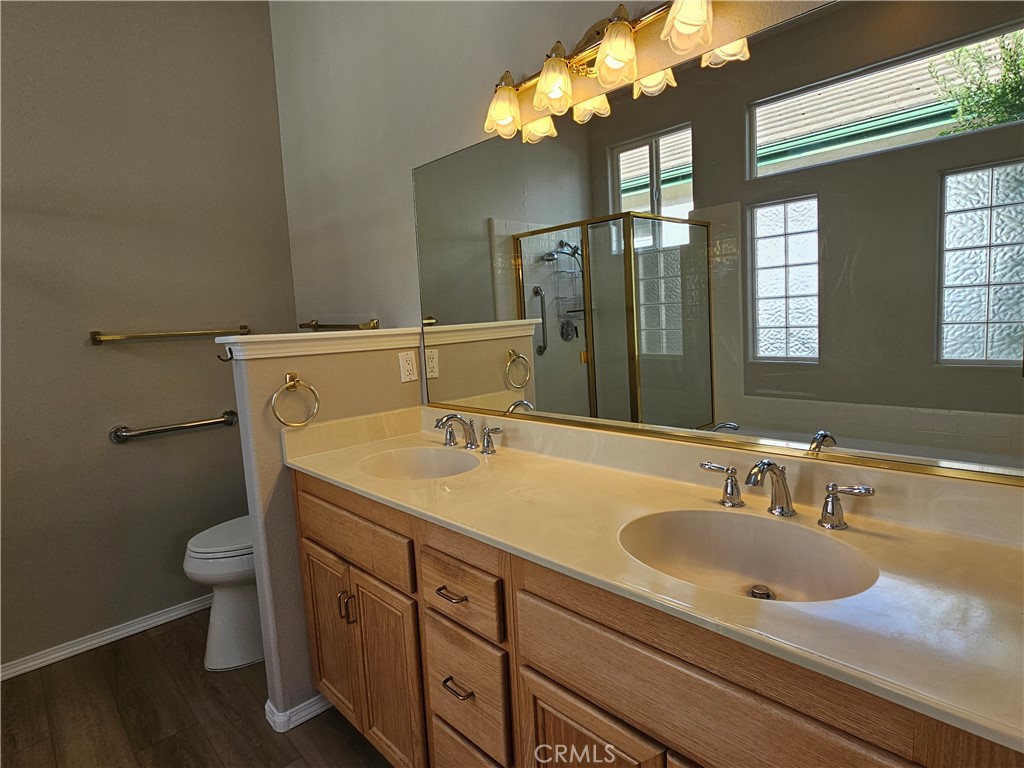 516 Morning Rise Lane Arroyo Grande, CA 93420 - Photo 11 of 16 a bathroom with a sink vanity granite and toilet