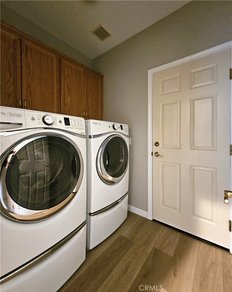516 Morning Rise Lane Arroyo Grande, CA 93420 - Photo 12 of 16 a utility room with dryer and washer