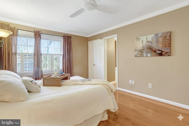 a bathroom with bathtub and window