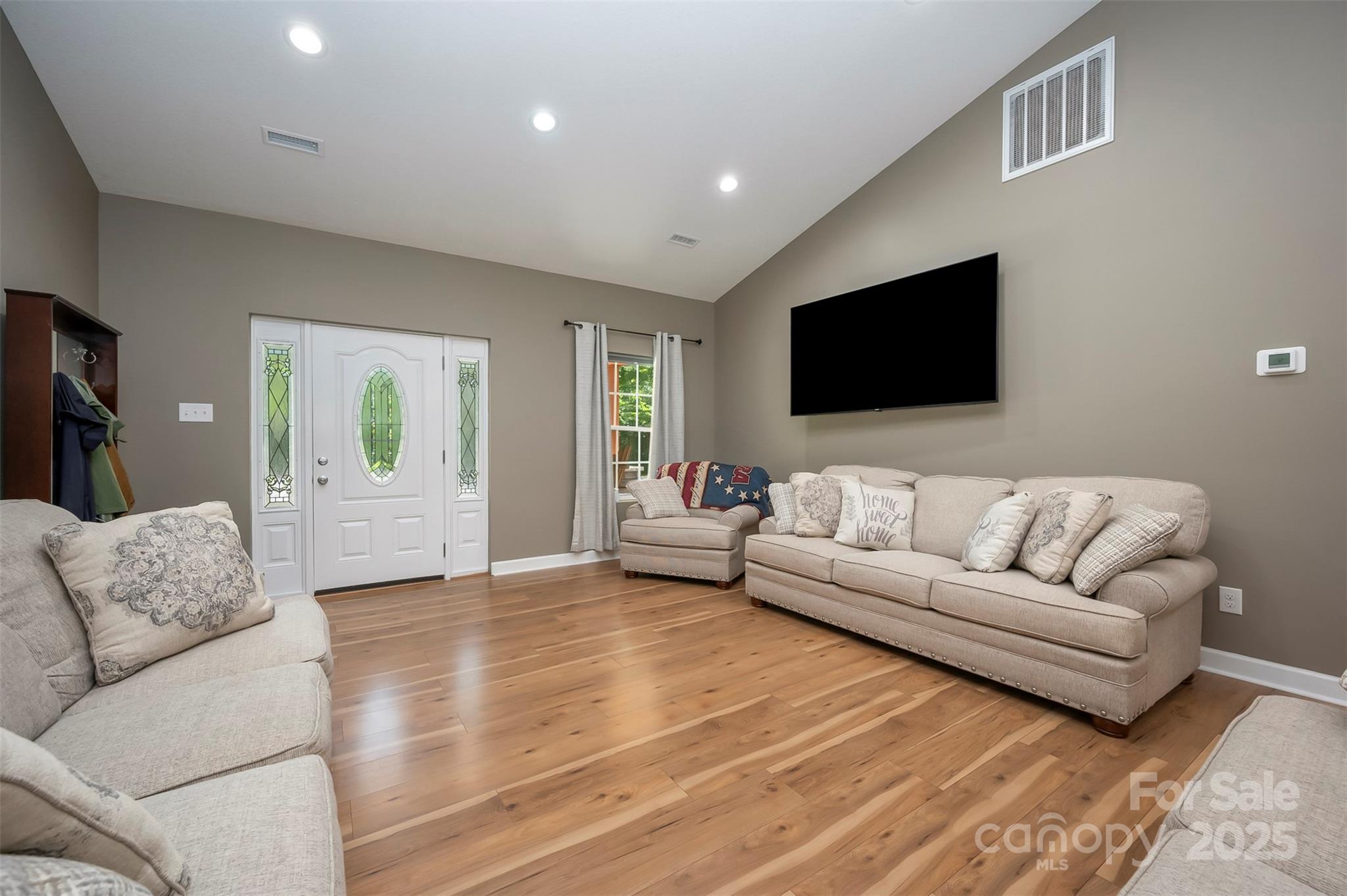 107 Grandview Drive Rutherfordton, NC 28139 - Photo 6 of 37 a living room with furniture and a flat screen tv