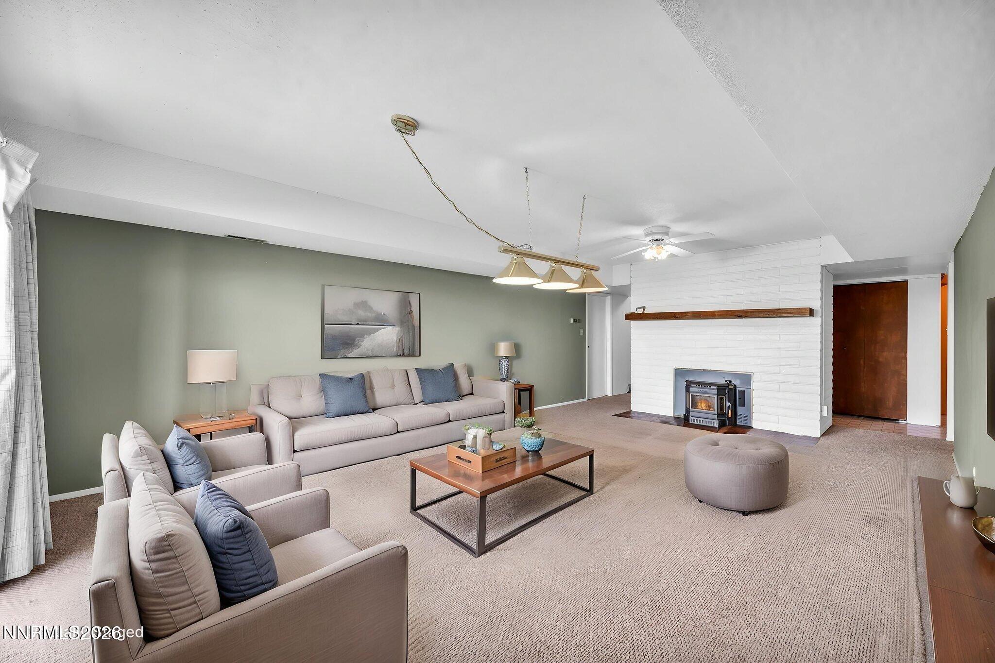 1970 Geiger Grade Road Reno, NV 89521 - Photo 29 of 45 a living room with furniture and a fireplace