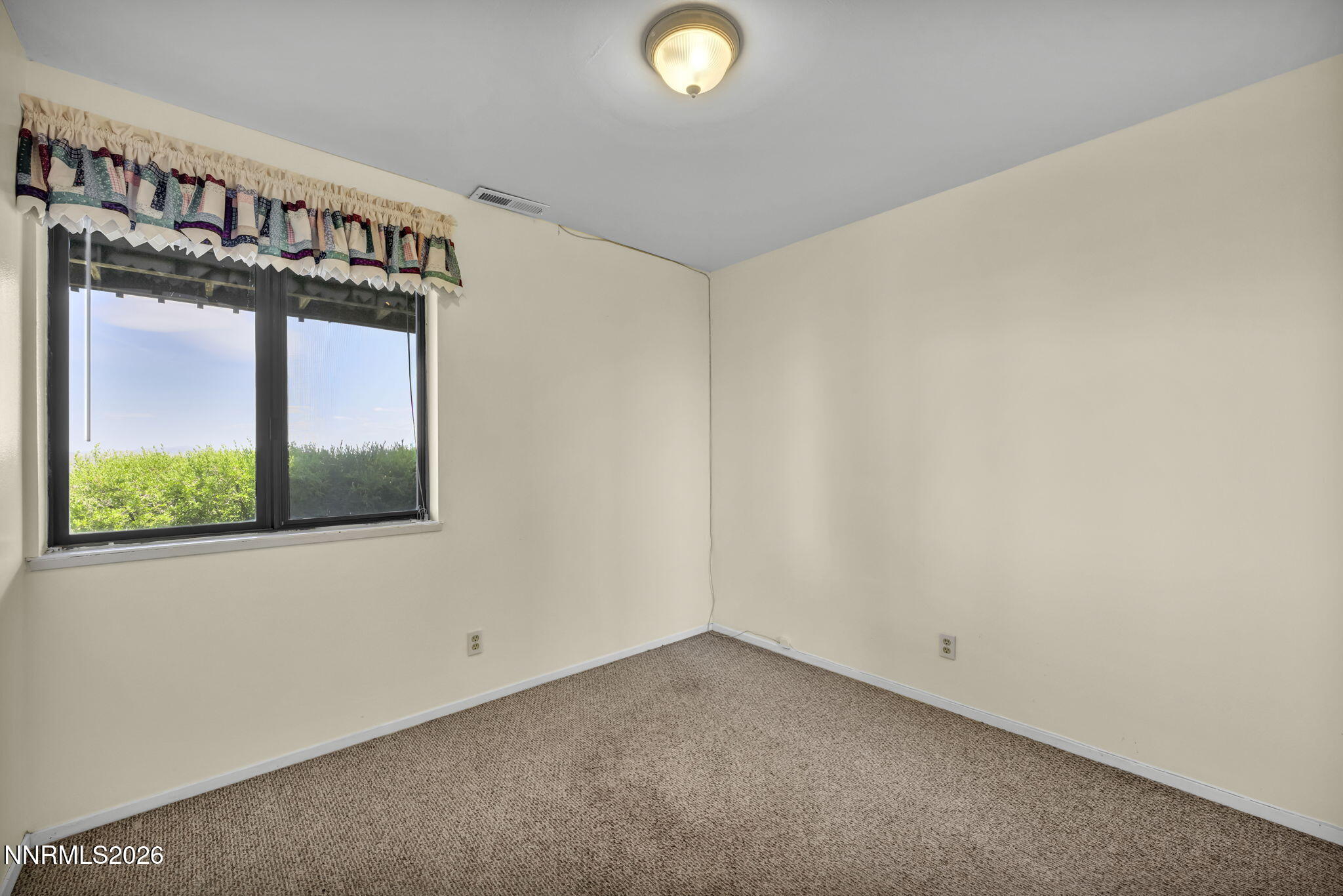 1970 Geiger Grade Road Reno, NV 89521 - Photo 35 of 45 a view of an empty room with a window