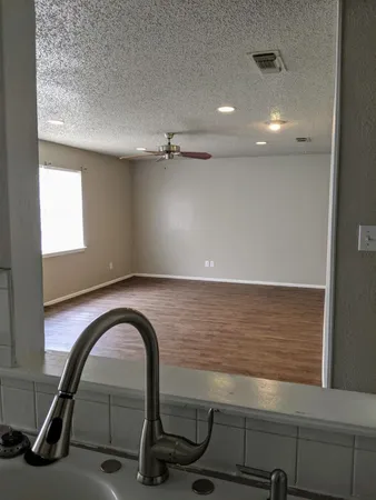 a room with a table and chairs