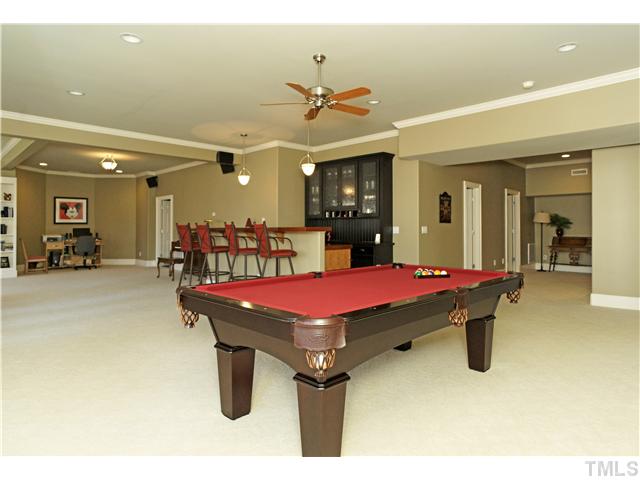 1001 Salcomb Lane Raleigh, NC 27614 - Photo 15 of 25 Expansive and Bright Basement with billiard area, wine cellar, exercise, bonus room, theater, studio/BR5 and more!