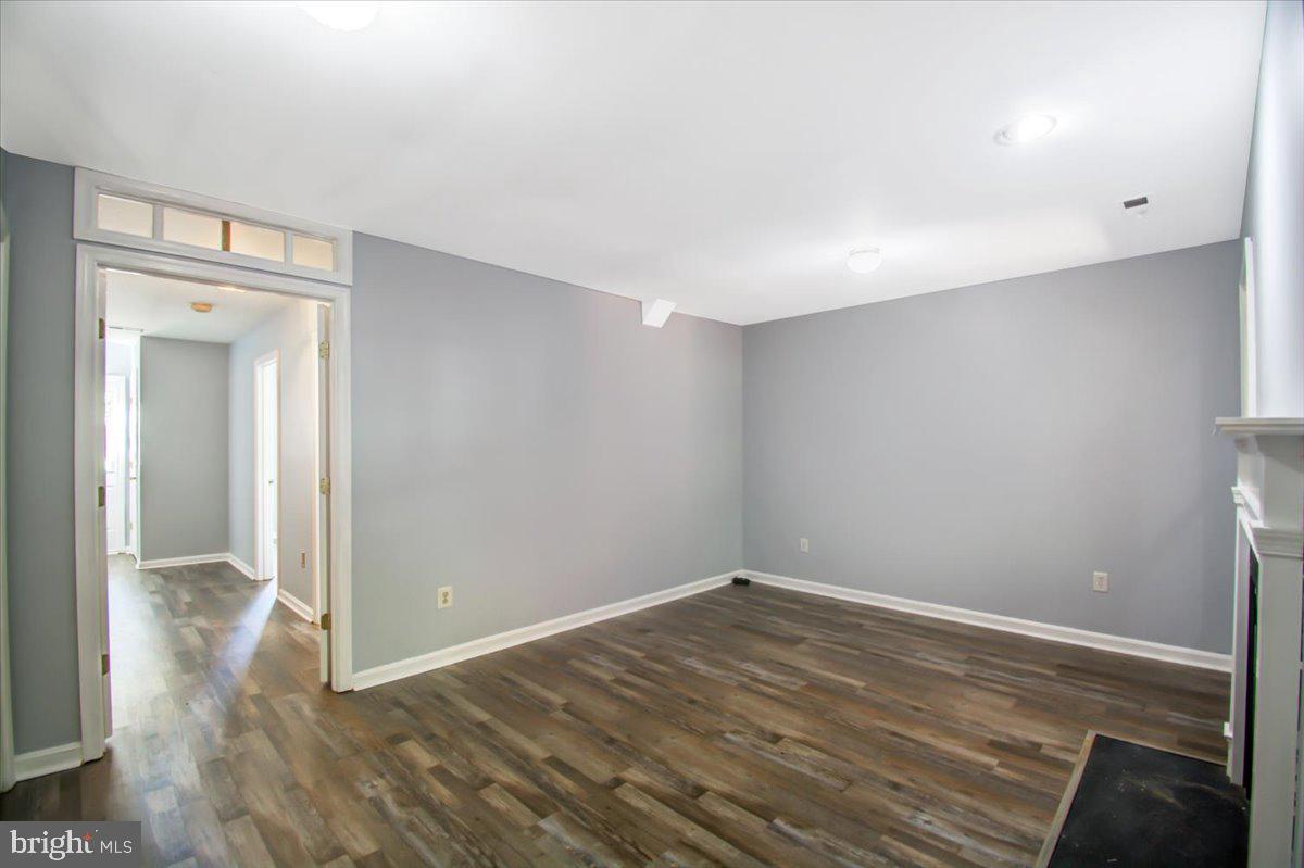 2207 Commissary Circle Odenton, MD 21113 - Photo 19 of 50 a view of a room with wooden floor