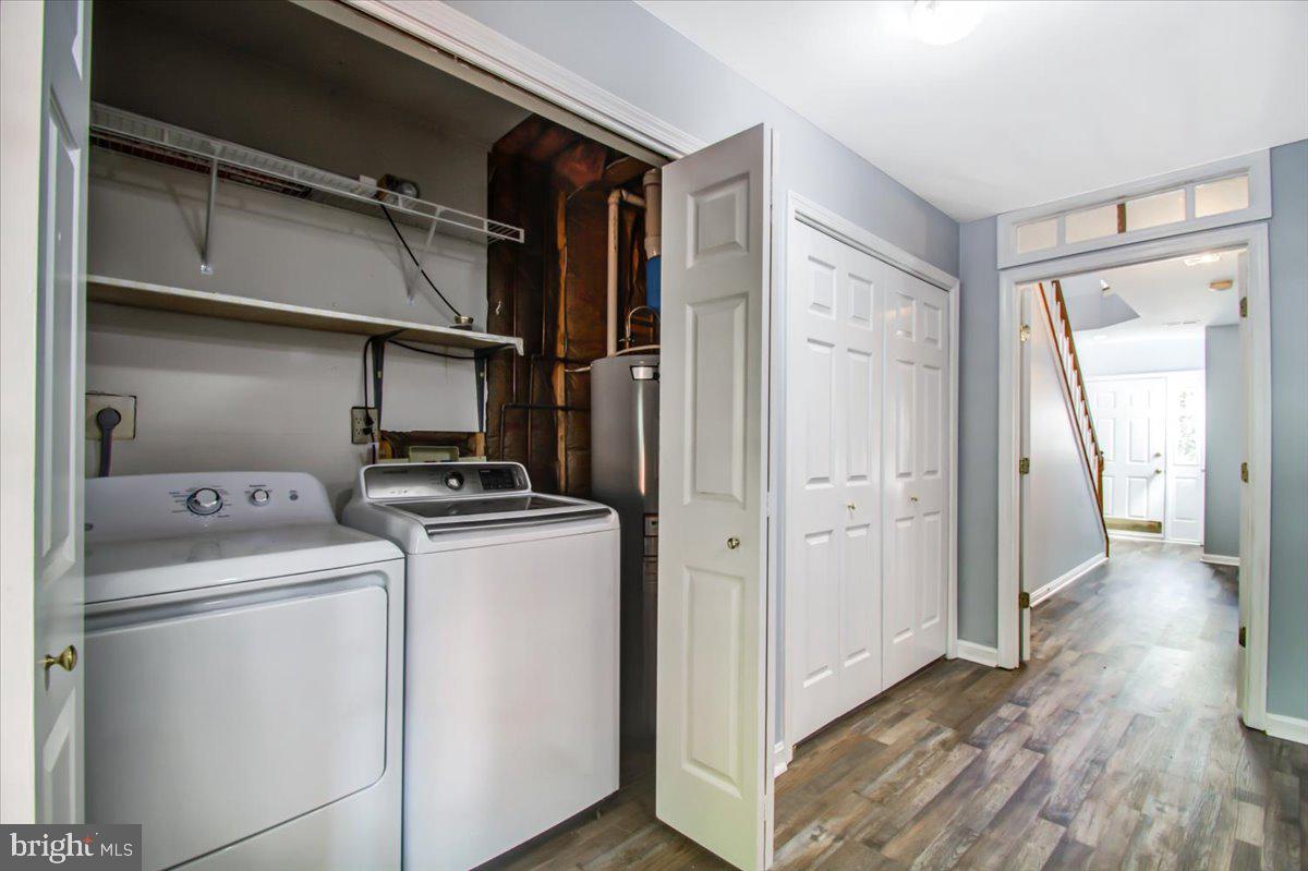 2207 Commissary Circle Odenton, MD 21113 - Photo 20 of 50 a view of storage and utility room with washer and dryer