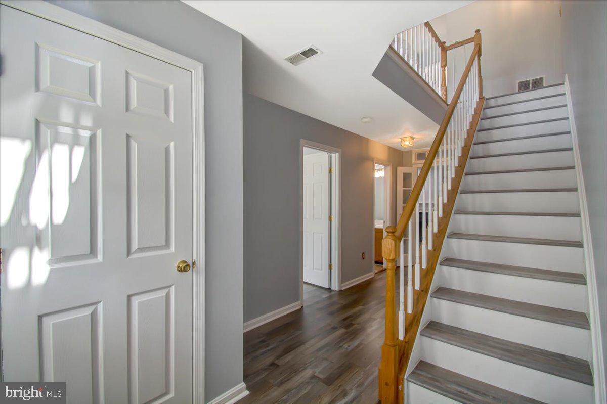 2207 Commissary Circle Odenton, MD 21113 - Photo 3 of 50 a view of entryway with wooden floor