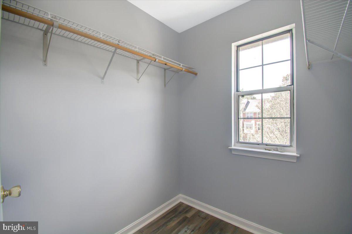 2207 Commissary Circle Odenton, MD 21113 - Photo 32 of 50 a view of a room with rack on the wall and a window