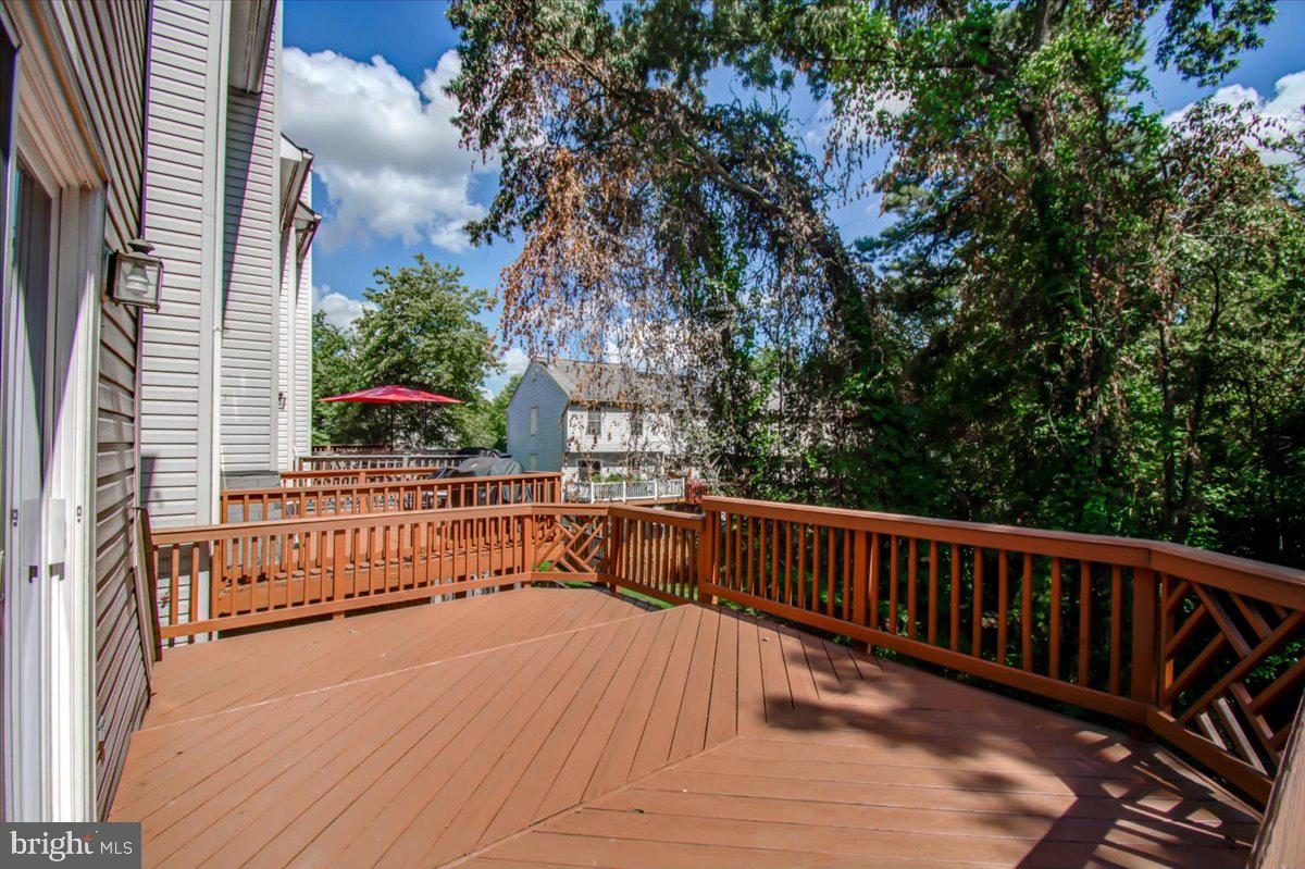 2207 Commissary Circle Odenton, MD 21113 - Photo 45 of 50 a view of balcony with wooden fence