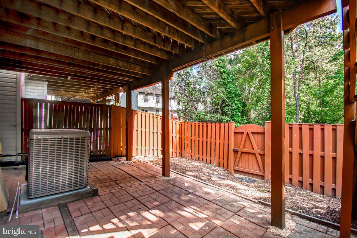 2207 Commissary Circle Odenton, MD 21113 - Photo 50 of 50 a view of porch with wooden floor