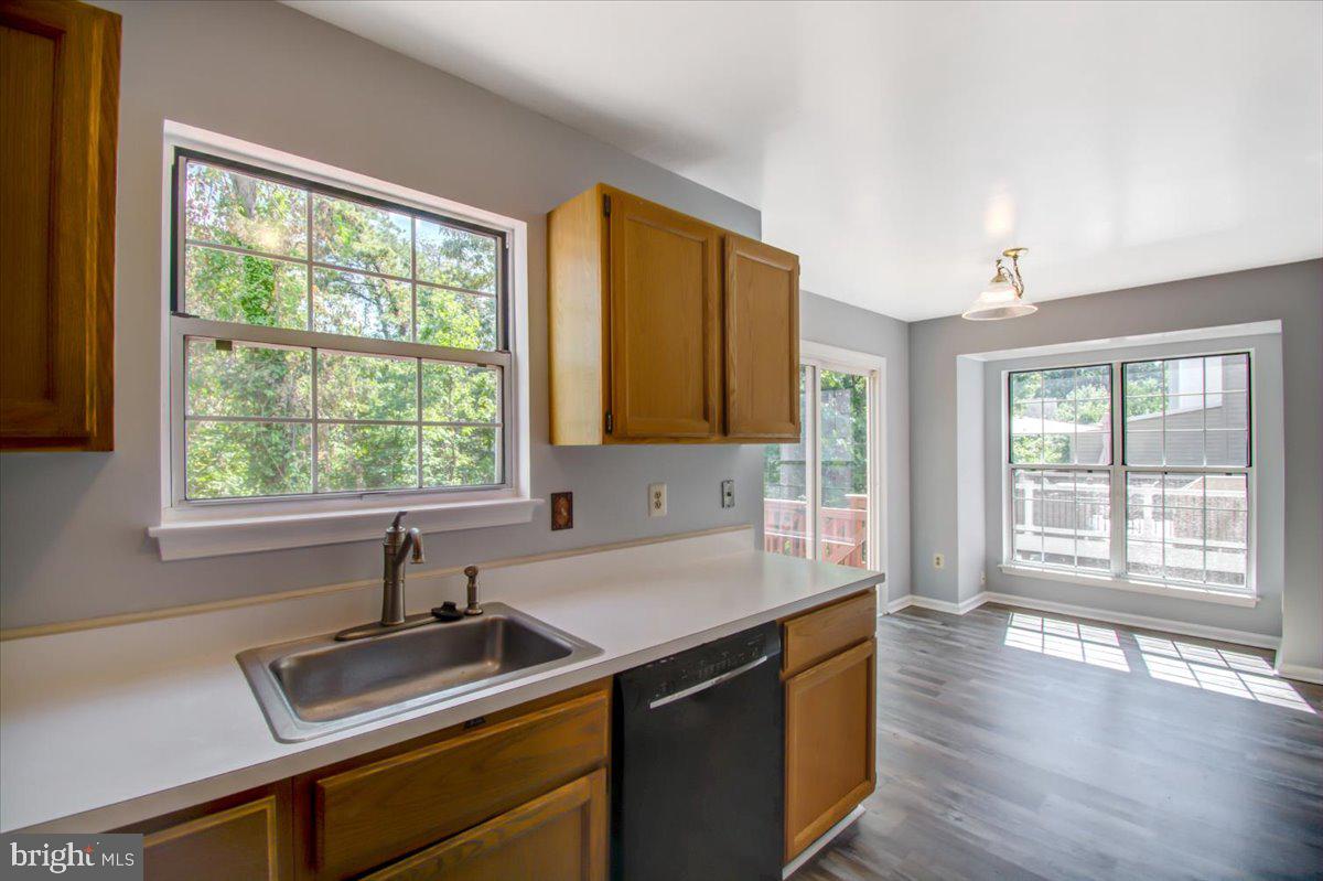 2207 Commissary Circle Odenton, MD 21113 - Photo 10 of 50 a kitchen that has a sink and a window