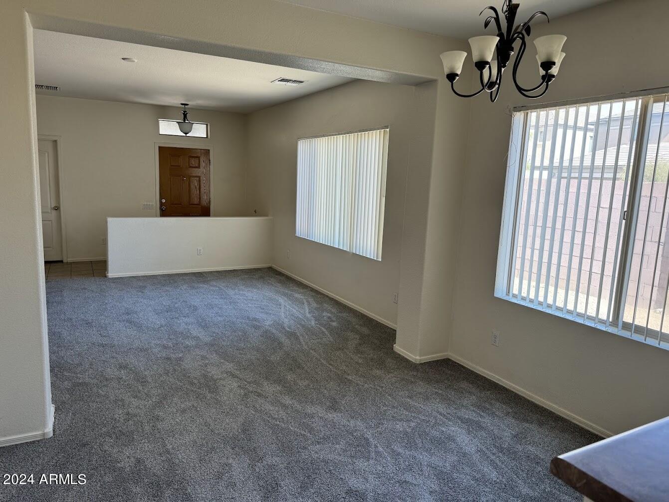 9401 West Berkeley Road Phoenix, AZ 85037 - Photo 12 of 27 a view of an empty room with a window