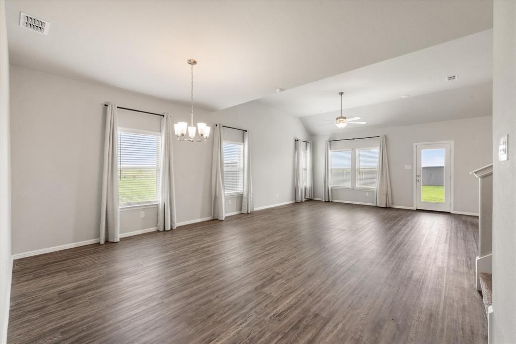 6910 Prairieside Trail Venus, TX 76084 - Photo 8 of 40 Same photo of open concept living dining area.