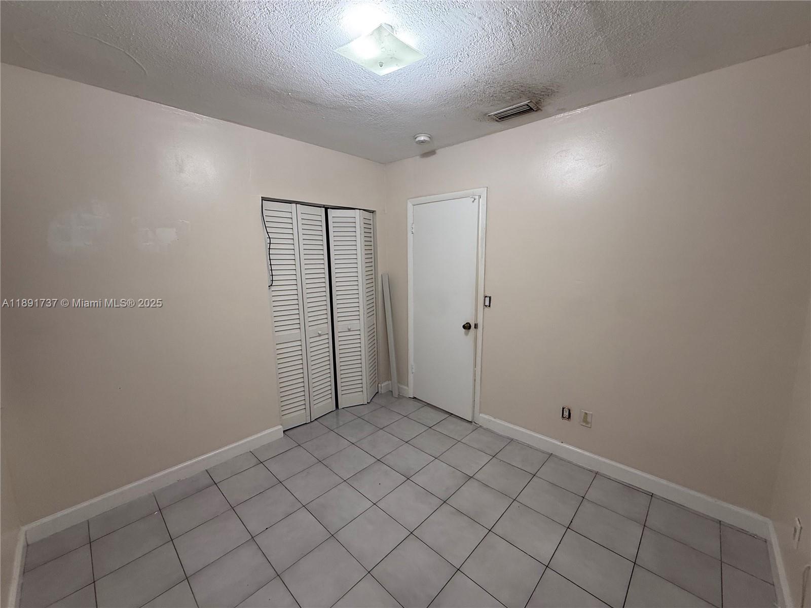 3450 Southwest 75th Court Miami, FL 33155 - Photo 14 of 22 a view of an empty room