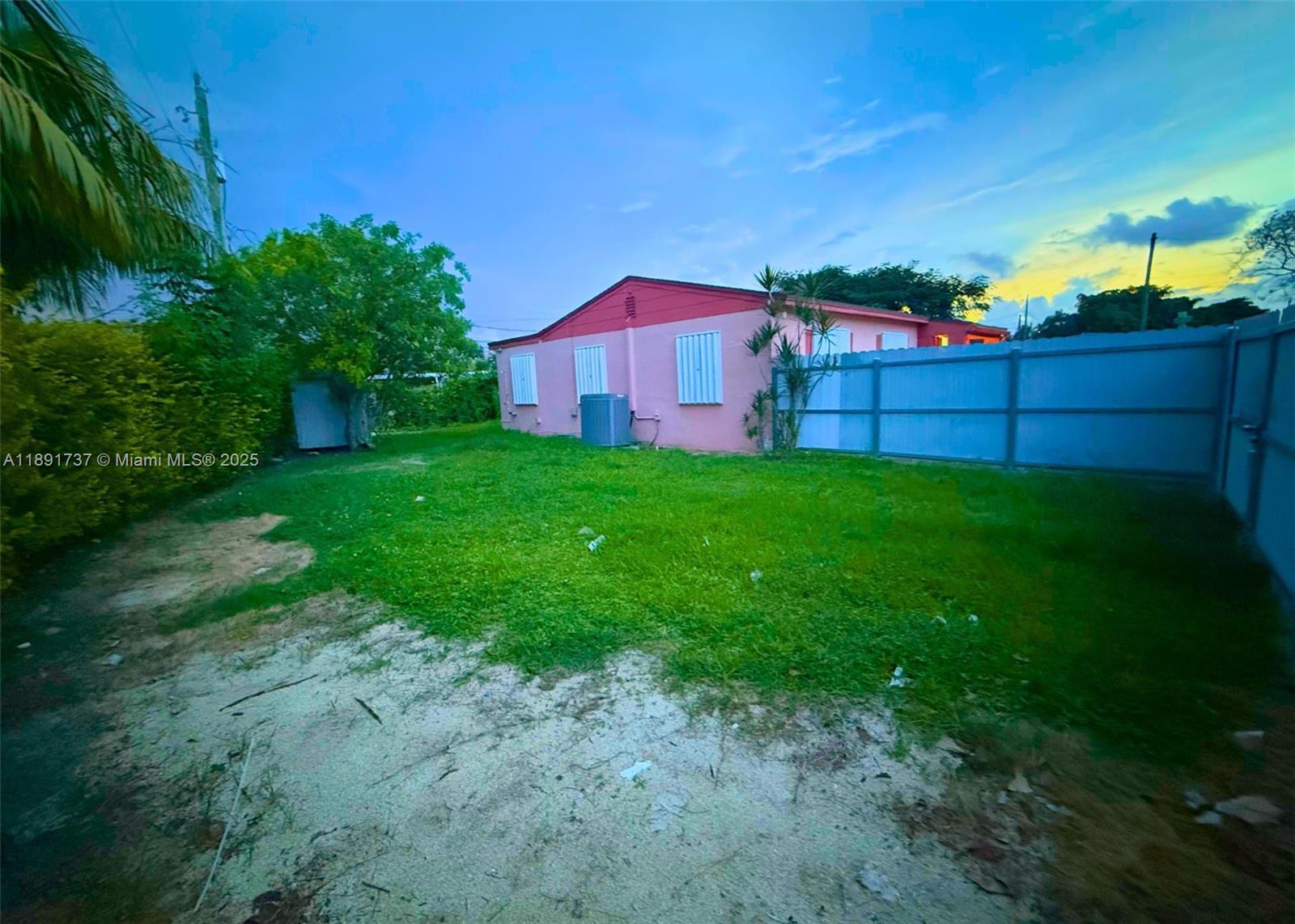 3450 Southwest 75th Court Miami, FL 33155 - Photo 21 of 22 a backyard of a house with lots of green space
