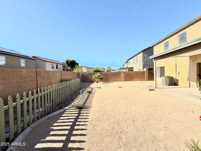a view of swimming pool with outdoor seating