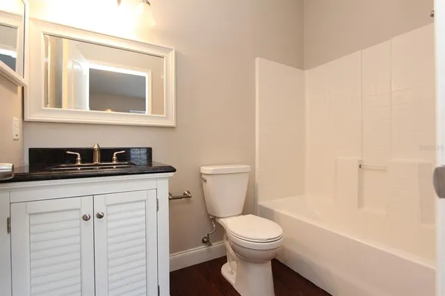 a view of a house of a back yard