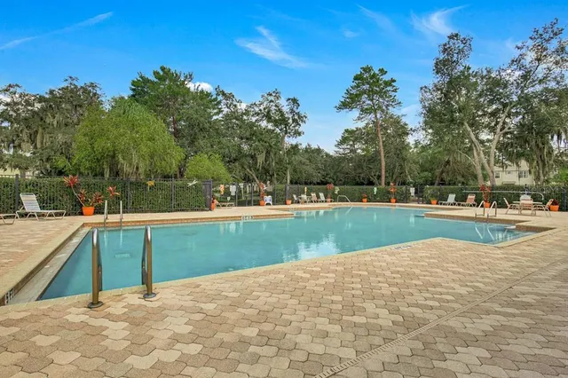 a view of a house with a swimming pool