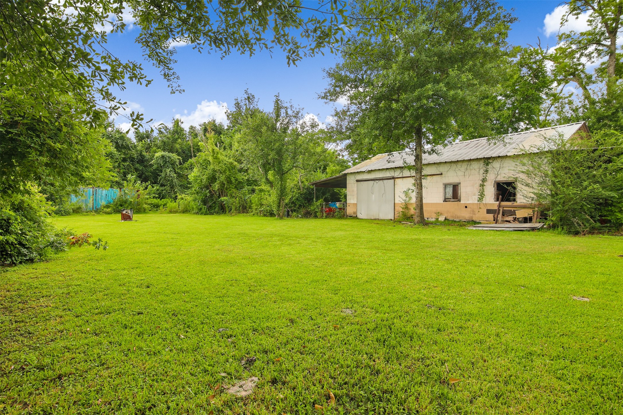 8406 East Mt Houston Road Houston, TX 77050 - Photo 25 of 30 a view of a house with a big yard