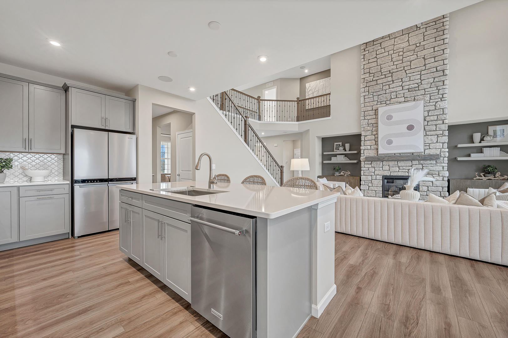 12554 Eileen Street Lemont, IL 60439 - Photo 5 of 17 a kitchen with stainless steel appliances granite countertop a sink and a refrigerator