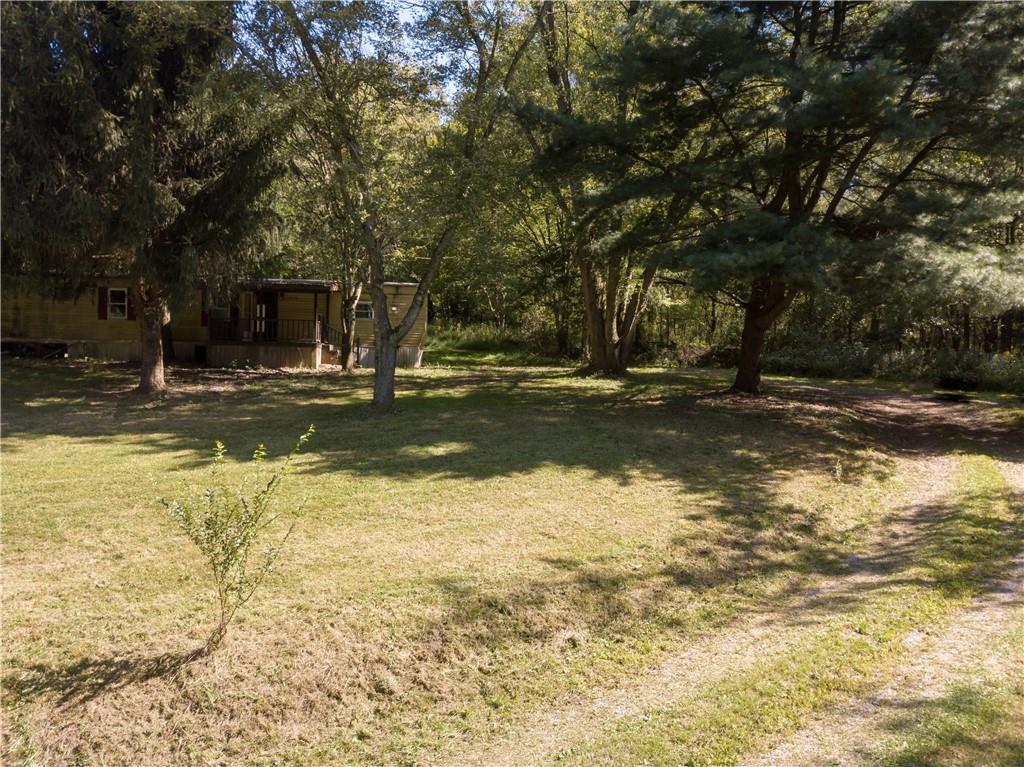 200 Toy Road Kittanning, PA 16201 - Photo 3 of 11 a view of a yard with a fountain