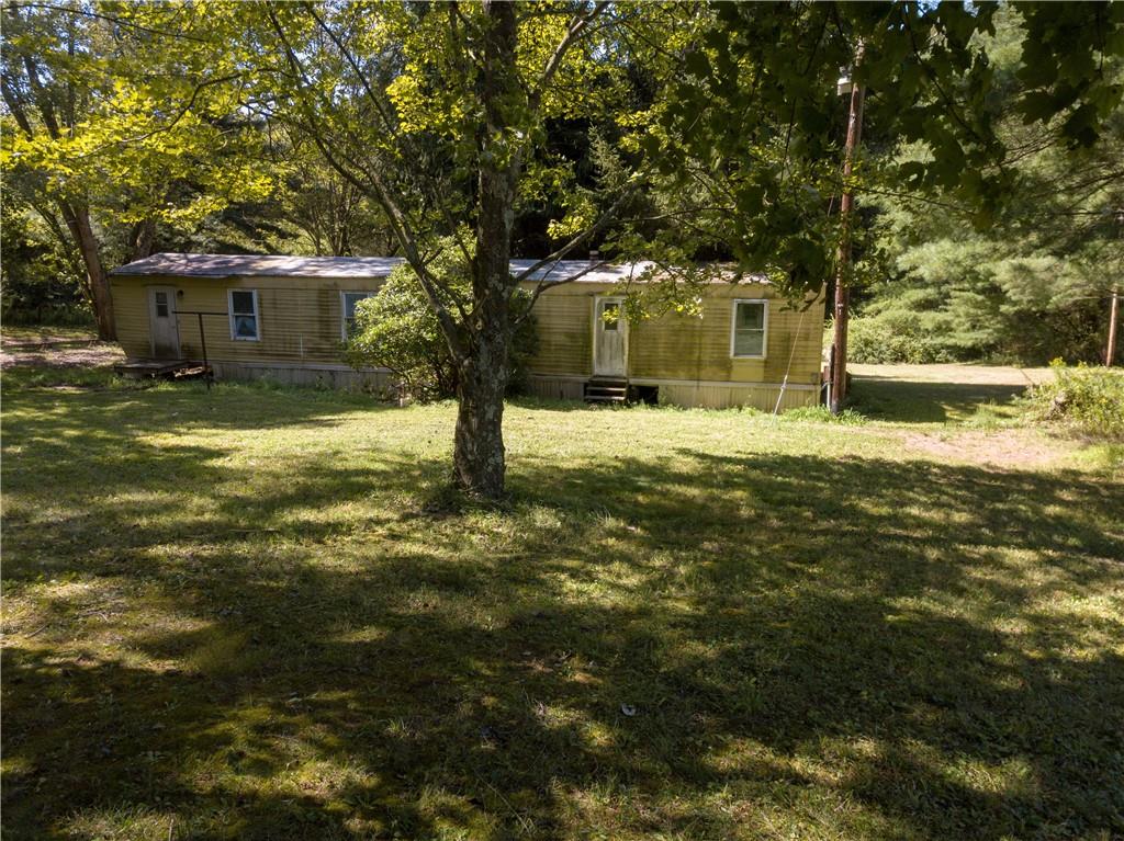 200 Toy Road Kittanning, PA 16201 - Photo 8 of 11 a front view of a house with a yard