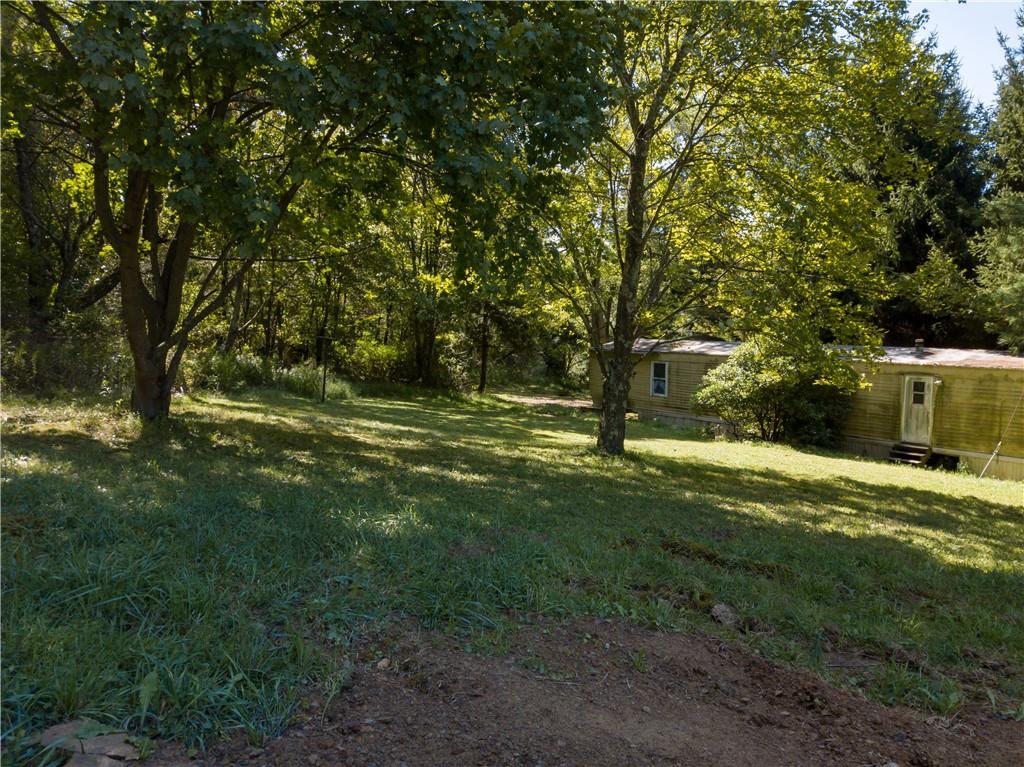 200 Toy Road Kittanning, PA 16201 - Photo 9 of 11 a view of outdoor space with trees all around
