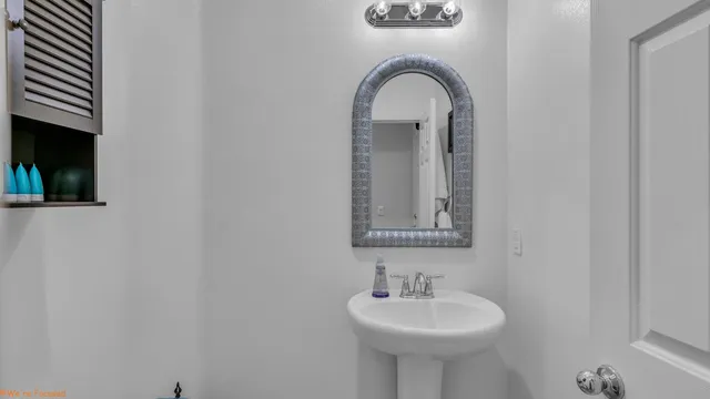 a view of a chairs and table in the balcony