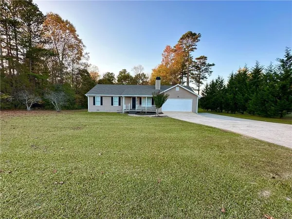 a view of a house with a big yard