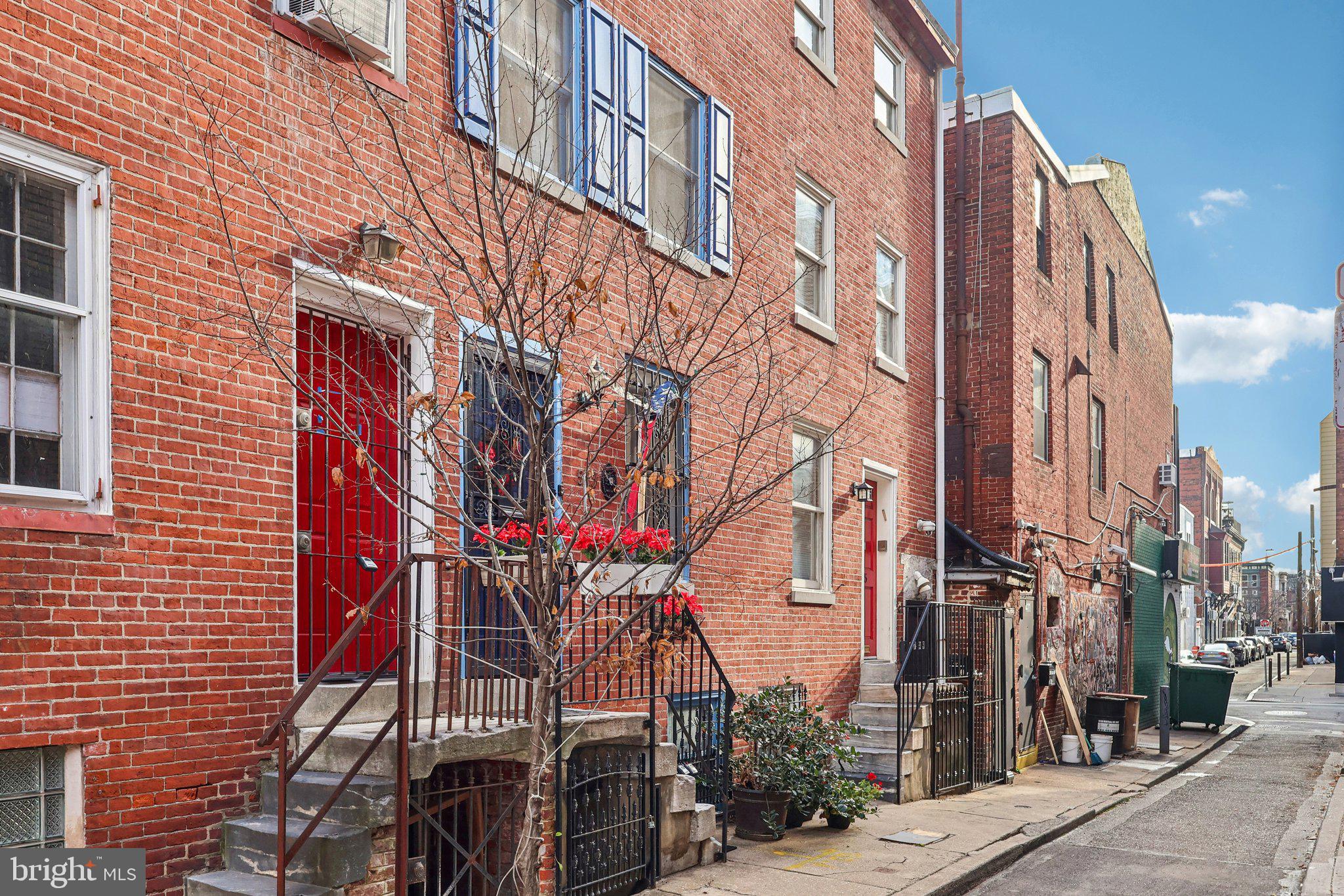 523 South Leithgow Street Philadelphia, PA 19147 - Photo 2 of 35 a view of a brick building with many windows
