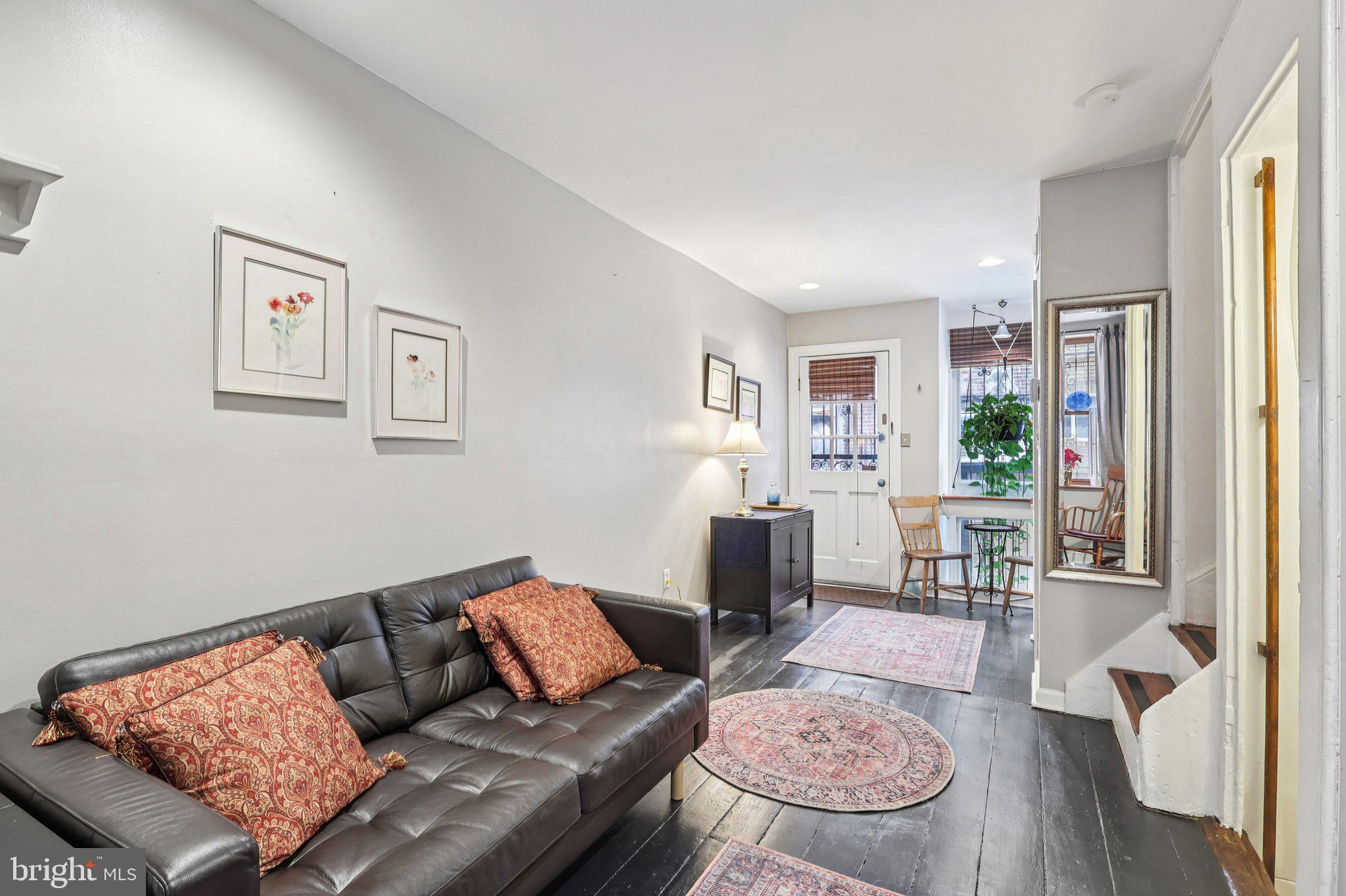 523 South Leithgow Street Philadelphia, PA 19147 - Photo 7 of 35 a living room with furniture and wooden floor