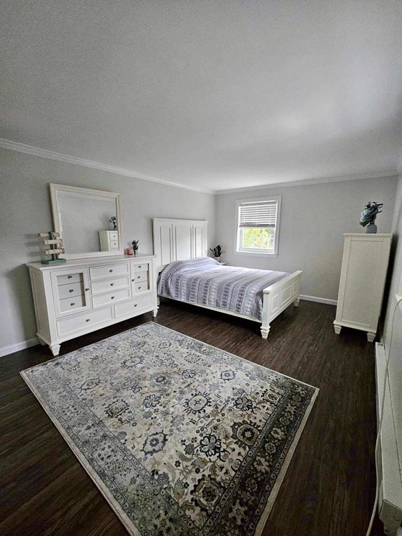 35 Berlin Street, Unit 218 Clinton, MA 01510 - Photo 6 of 13 a bedroom with a bed and window