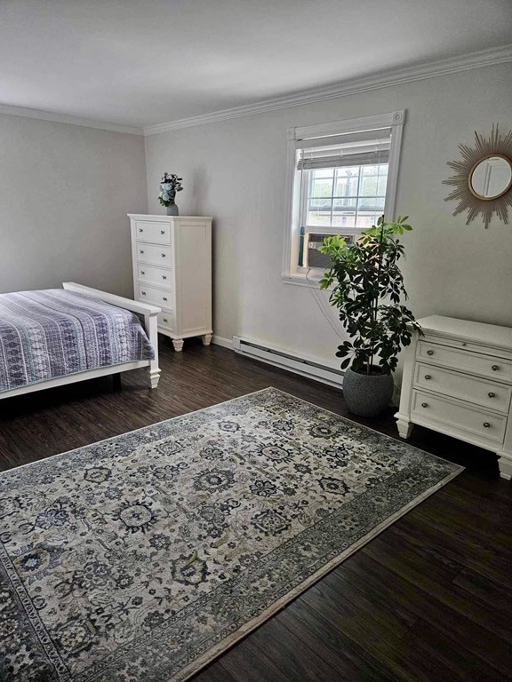35 Berlin Street, Unit 218 Clinton, MA 01510 - Photo 7 of 13 a bedroom with a bed and a window