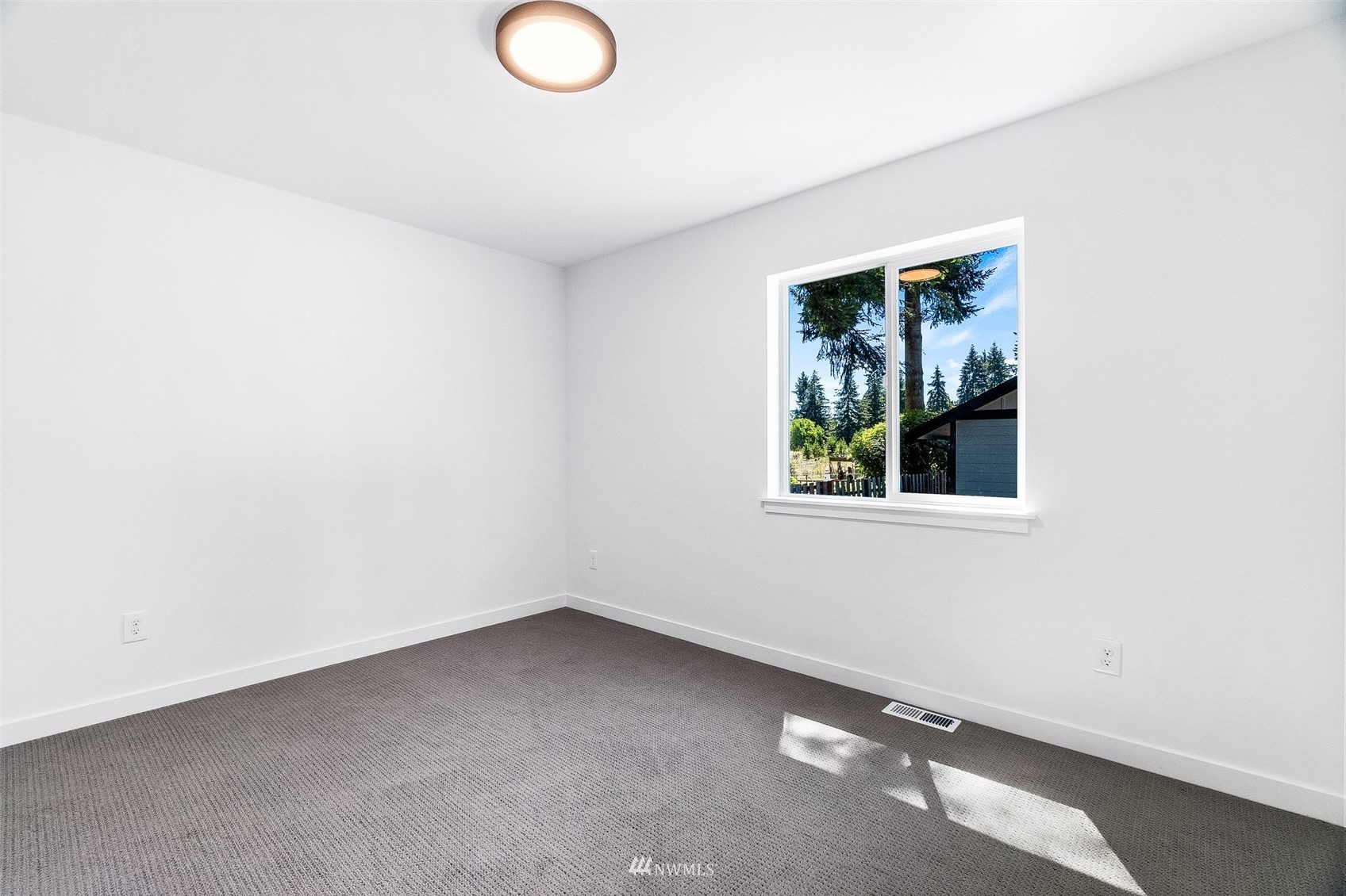 9815 178th Way Southwest Rochester, WA 98579 - Photo 22 of 35 an empty room with windows